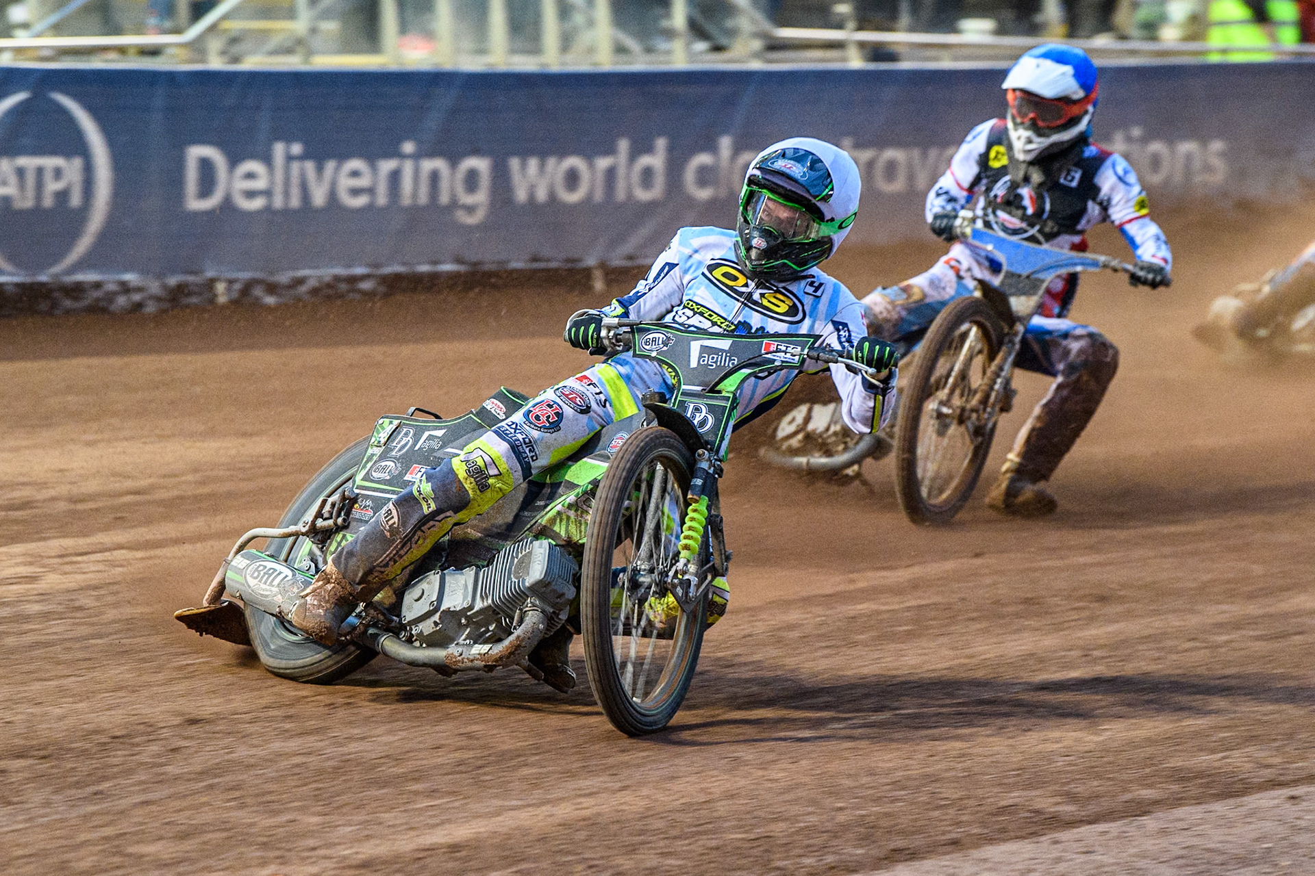 Oxford Spires' Charles Wright  in White leading Belle Vue Aces' guest Antti Vuolas  in Blue during the Rowe Motor Oil Premiership match between Belle Vue Aces and Oxford Spires at the National Speedway Stadium, Manchester on Monday 22nd July 2024. (Photo: Ian Charles | MI News)