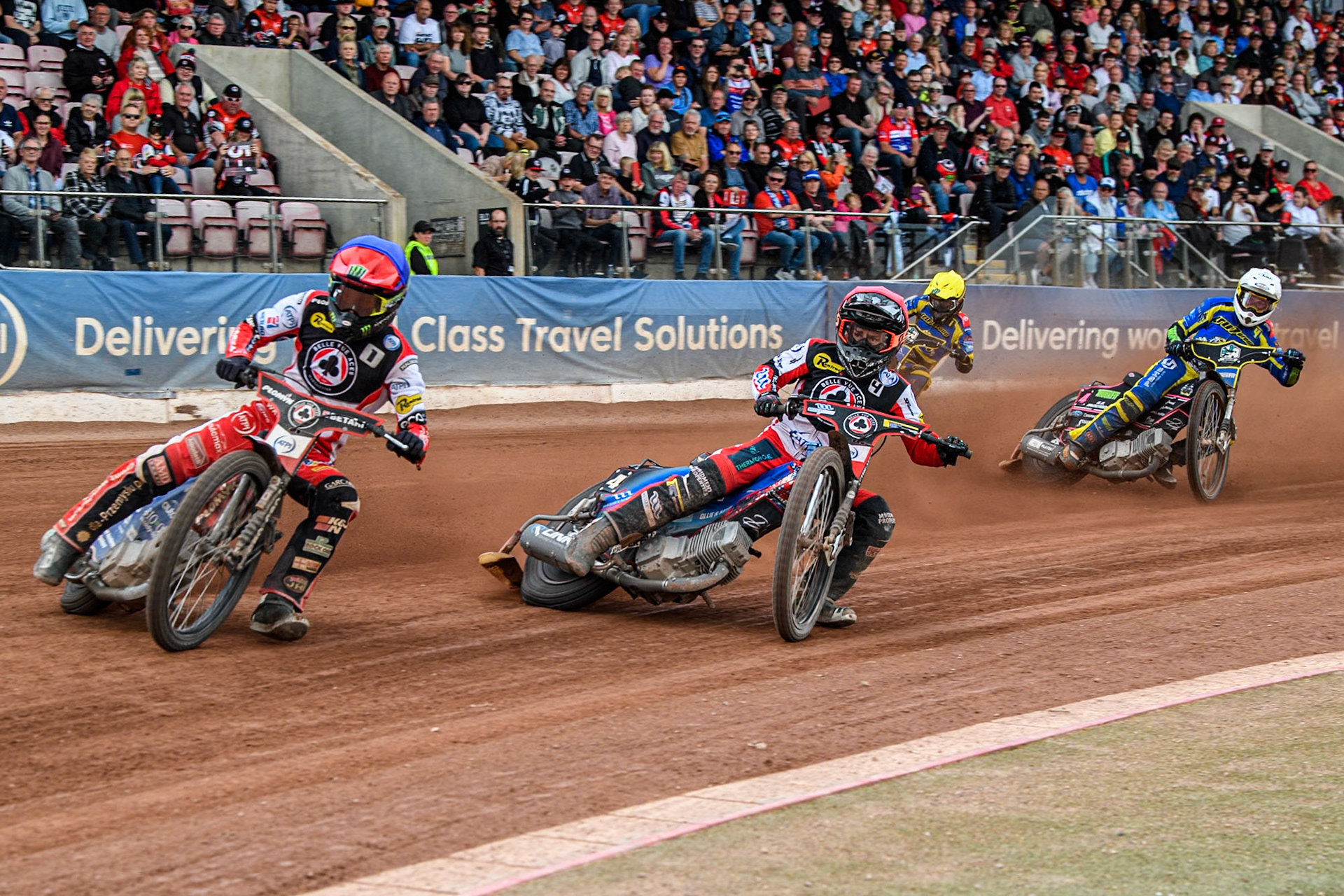 Belle Vue Aces' Dan Bewley in Blue and Belle Vue Aces' Ben Cook in Red leading Sheffield Tigers' Josh Pickering  in White and Sheffield Tigers' Jack Holder  in Yellow  during the Rowe Motor Oil Premiership match between Belle Vue Aces and Sheffield Tigers at the National Speedway Stadium, Manchester on Monday 26th August 2024. (Photo: Ian Charles | MI News)