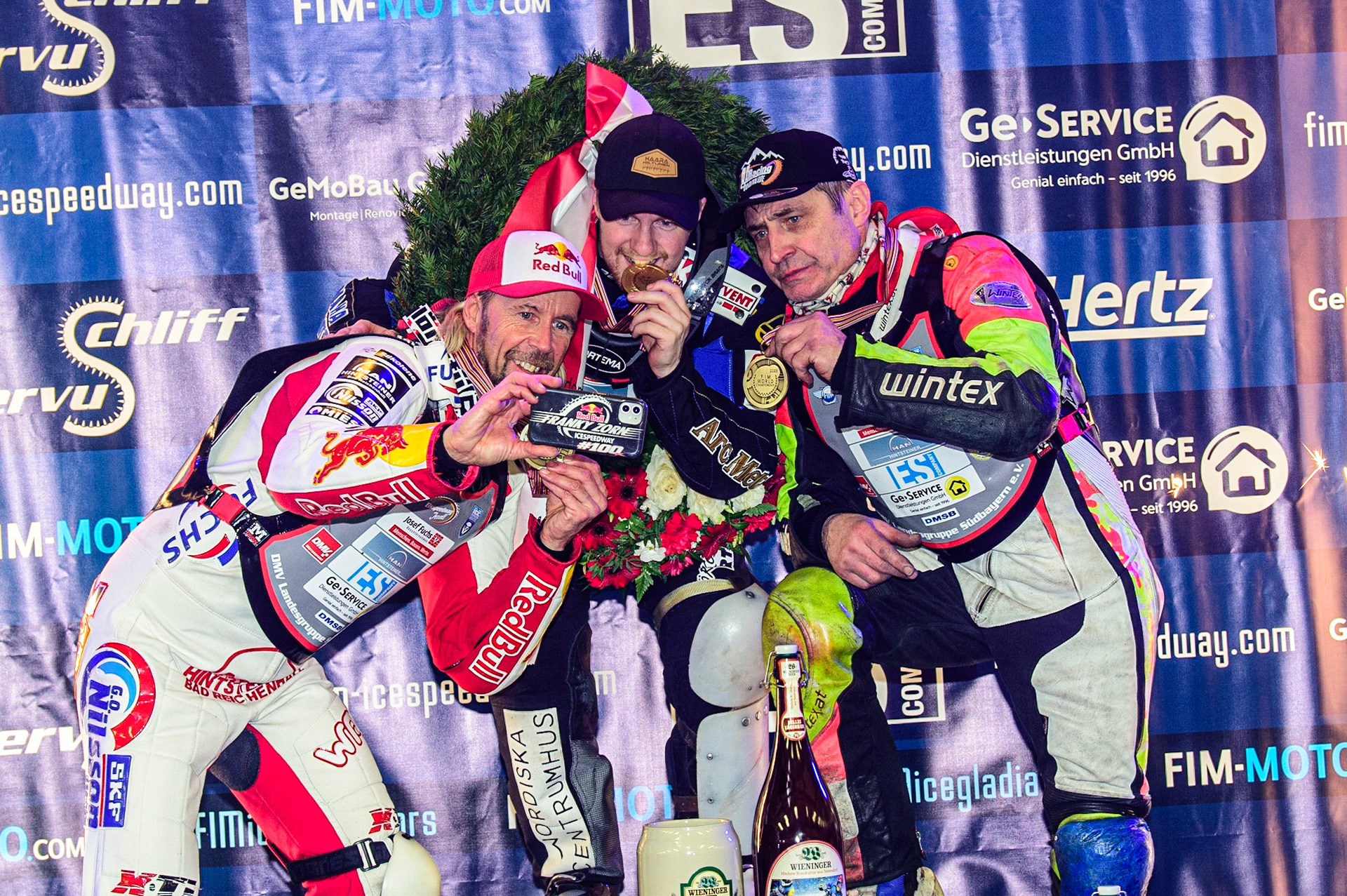 Selfie time for the World Top 3: (l-r) Franz Zorn (2nd), Martin Haarahiltunen (World Champion), Harald Simon (3rd) during the Ice Speedway Gladiators World Championship Final 2 at Max-Aicher-Arena, Inzell, Germany on Sunday 19th March 2023. (Photo: Ian Charles | MI News)