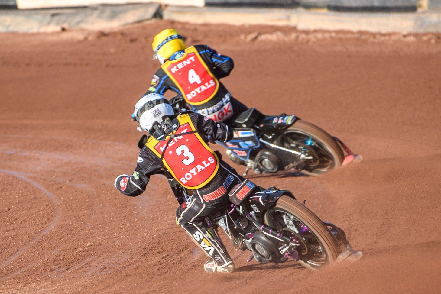 Connor King (White) chases team mate Tom Woolley (Yellow) during the National Development League match between Belle Vue Colts and Kent Royals at the National Speedway Stadium, Manchester on Friday 7th July 2023. (Photo: Ian Charles | MI News)