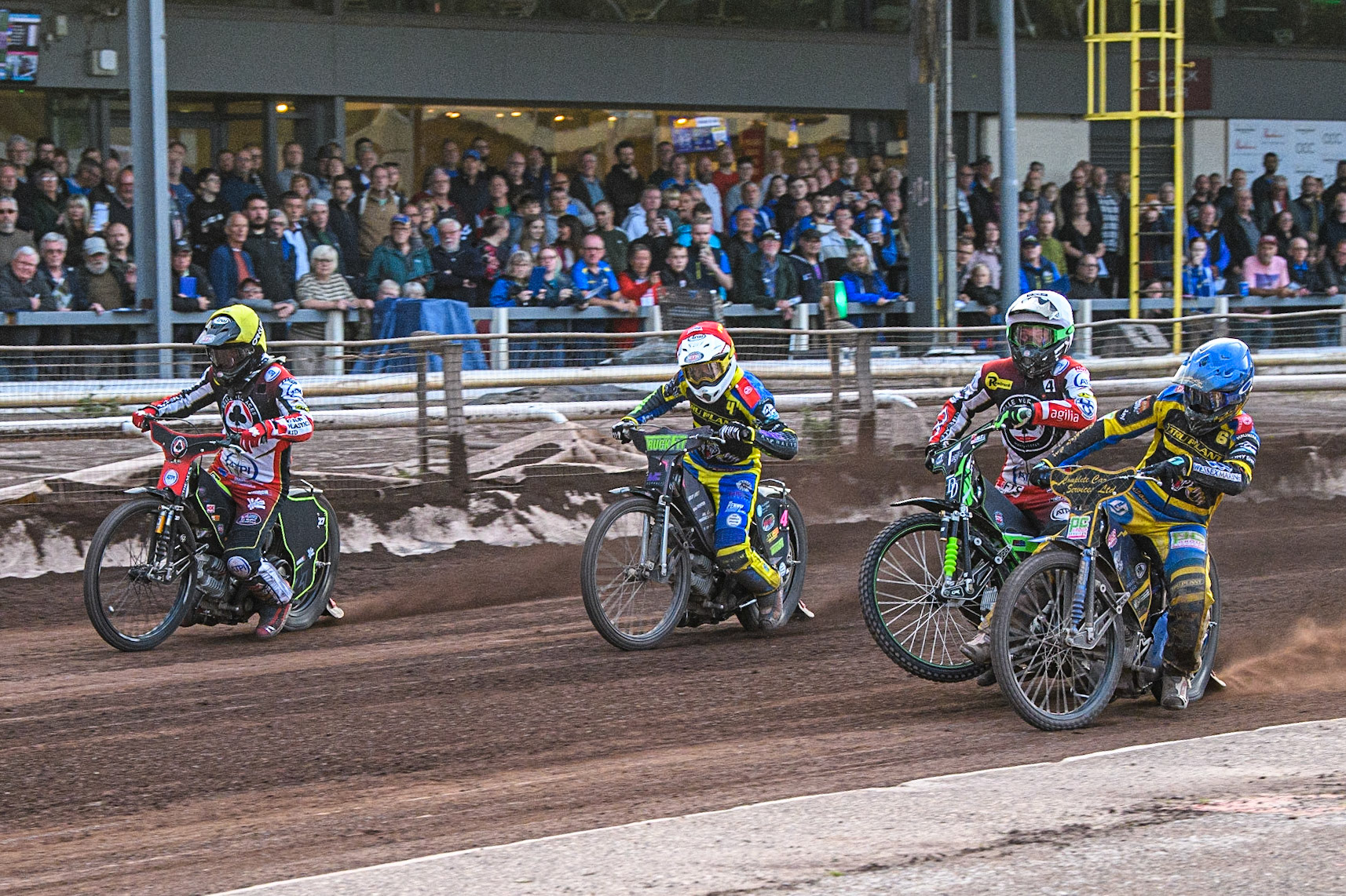 (l - r) Tom Brennan (Yellow) Josh Pickering (Red) Charles Wright (White) and Kyle Howarth (Blue) head to the first turn during the Sports Insure Premiership match between Sheffield Tigers and Belle Vue Aces at Owlerton Stadium, Sheffield on Thursday 20th July 2023. (Photo: Ian Charles | MI News)