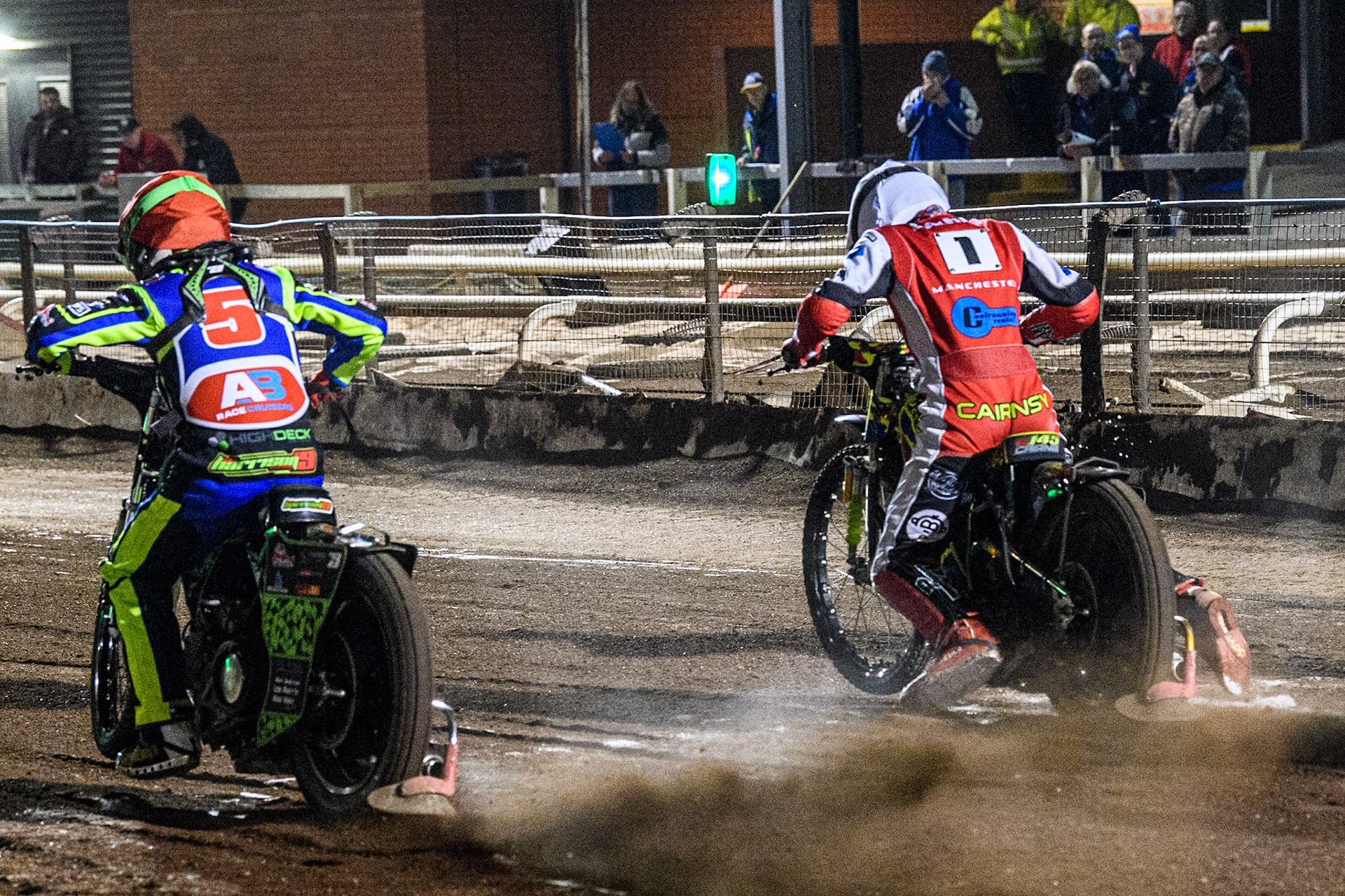 Steelers' Luke Harrison in Red and Belle Vue Colts' William Cairns in White leave the start during the WSRA National Development League match between Steelers and Belle Vue Colts at Owlerton Stadium, Sheffield on Monday 5th May 2025. (Photo: Ian Charles | MI News)