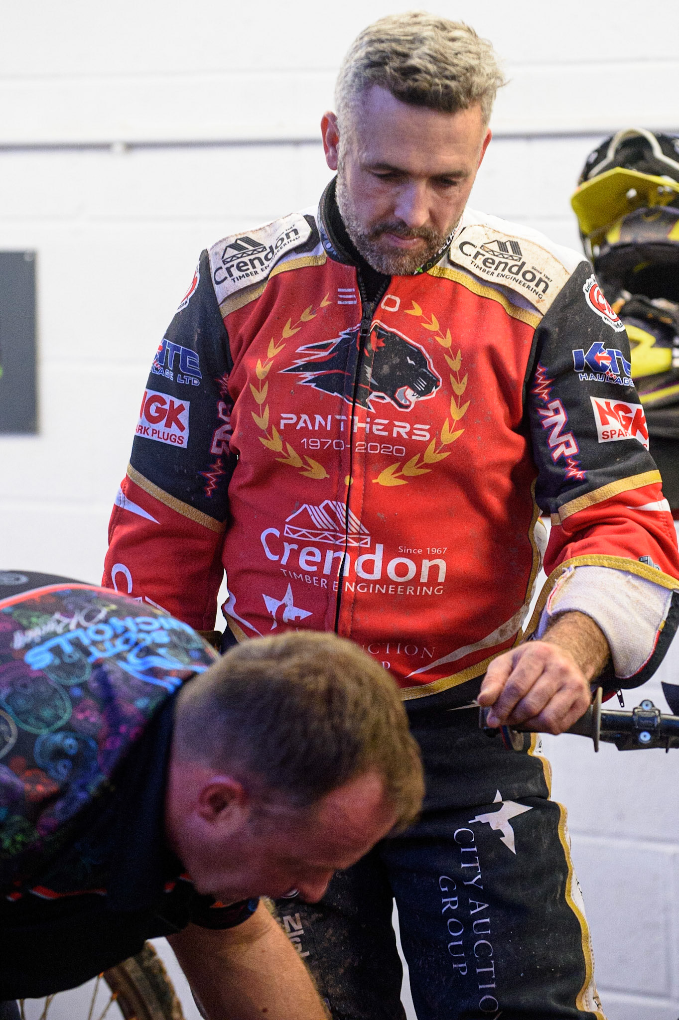 MANCHESTER, UK. AUG 9TH  Scott Nicholls  checks his mechanics work on the bike during the SGB Premiership match between Belle Vue Aces and Peterborough at the National Speedway Stadium, Manchester on Monday 9th August 2021. (Credit: Ian Charles | MI News)