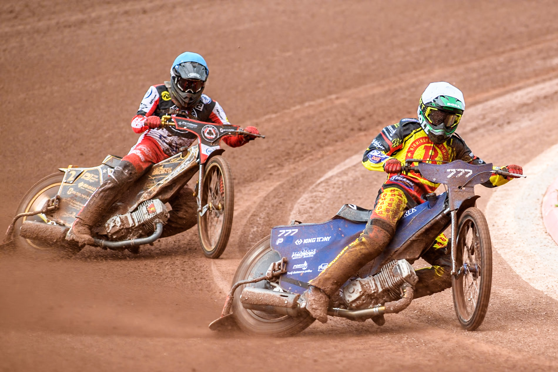 Birmingham Brummies' Piotr Pawlicki  in White leading Belle Vue Aces' Norick Blödorn  in Blue during the Rowe Motor Oil Premiership match between Belle Vue Aces and Birmingham Brummies at the National Speedway Stadium, Manchester on Monday 6th May 2024. (Photo: Ian Charles | MI News)
