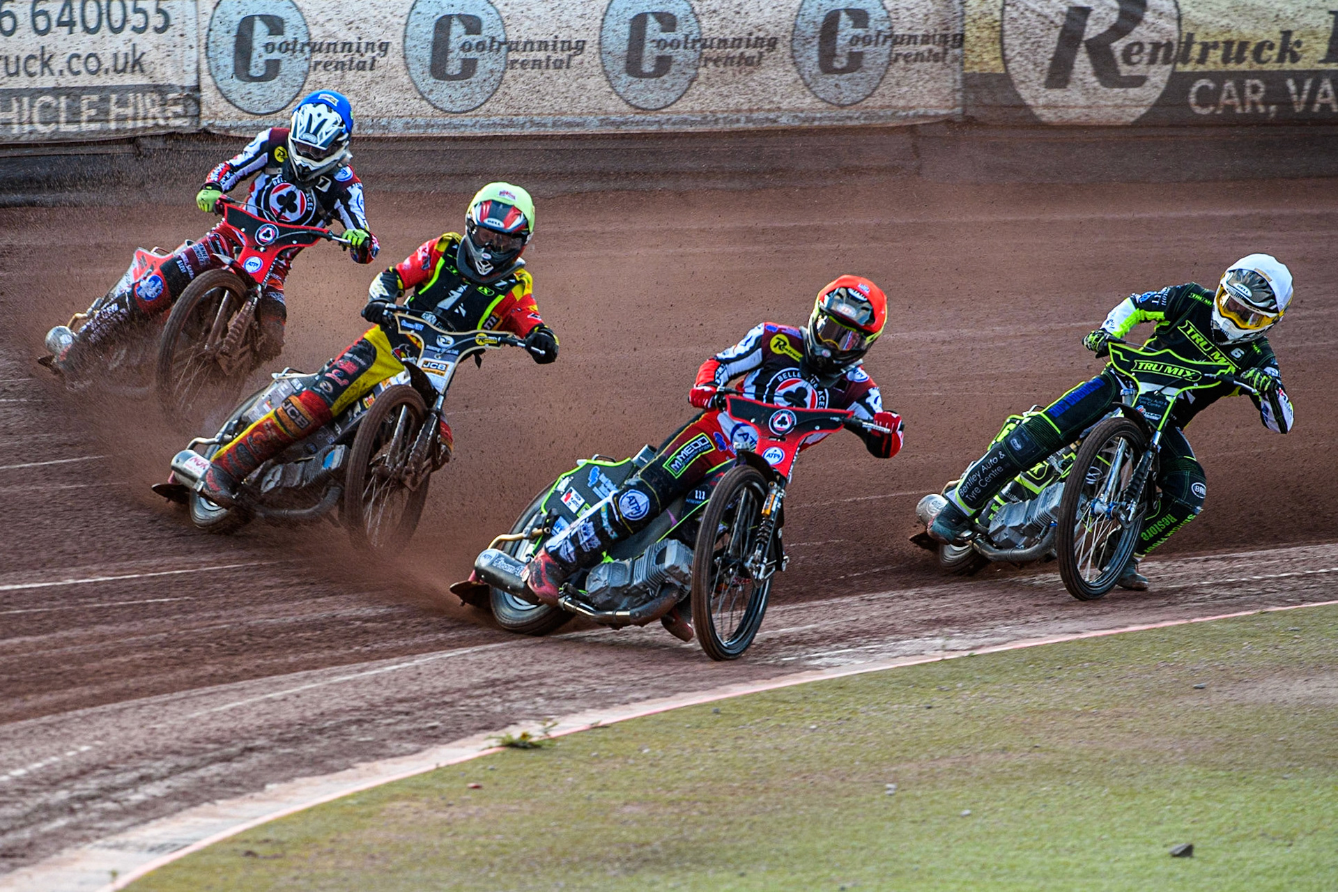 Tom Brennan (Red) leads Dan Thompson (Yellow), Danyon Hume (White) and Connor Bailey (Blue) during the Sports Insure Premiership match between Belle Vue Aces and Ipswich Witches at the National Speedway Stadium, Manchester on Monday 17th July 2023. (Photo: Ian Charles | MI News)