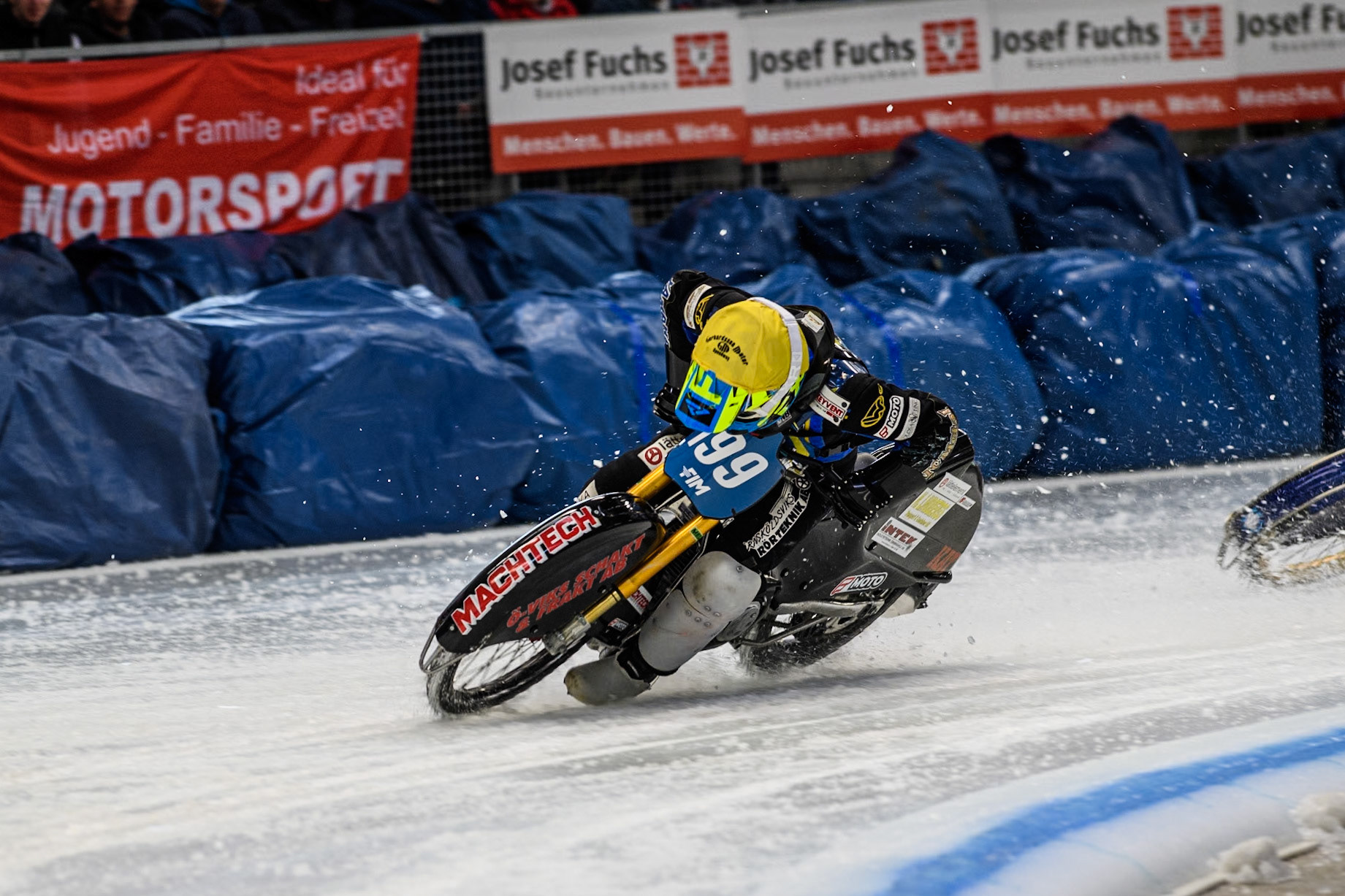 Sweden's Martin Haarahiltunen (199)  gets into difficulty and manages to correct it during the FIM Ice Speedway Gladiators World Championship Final 2 at the Max-Aicher-Arena, Inzell on Sunday 24 March 2024. (Photo: Ian Charles | MI News)