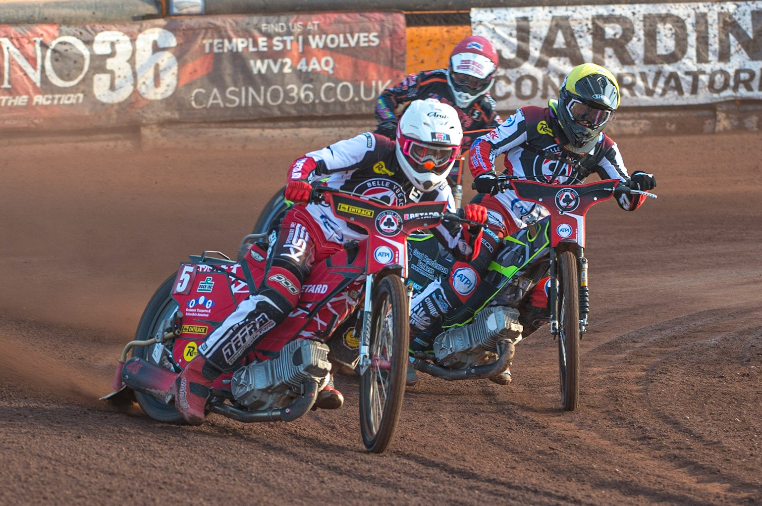 WOLVERHAMPTON, UK. JUN 20TH Max Fricke  (White) and Tom Brennan  (Yellow) lead Nick Morris  (Red)  during the SGB Premiership match between Wolverhampton Wolves and Belle Vue Aces at Monmore Green Stadium, Wolverhampton on Monday 20th June 2022. (Credit: Ian Charles | MI News)