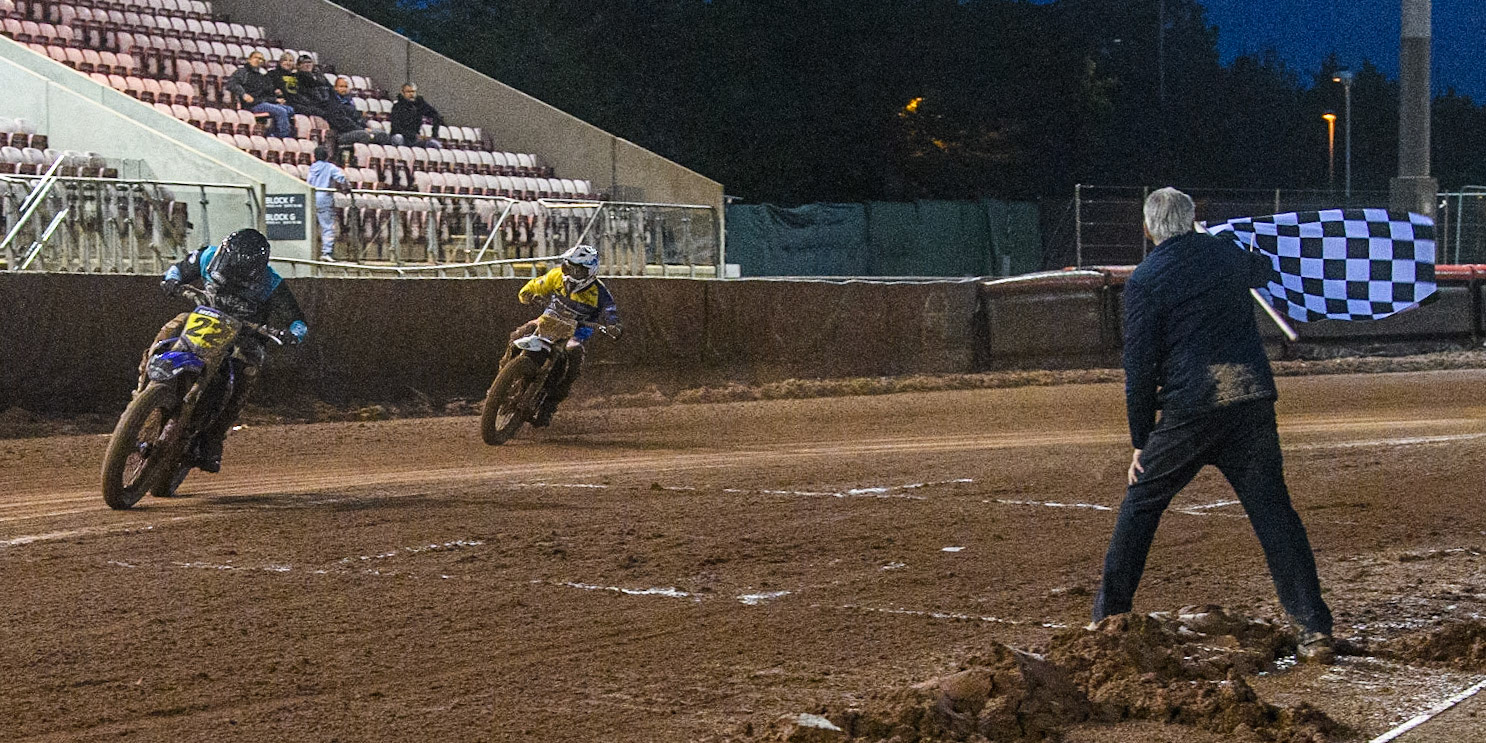 Ondřej Svědík (22) Czech Rep. takes the chequered flag to win the Grand Final during the FIM World Flat Track Championship Round 1 at the National Speedway Stadium, Manchester on Saturday 5th August 2023. (Photo: Ian Charles | MI News)