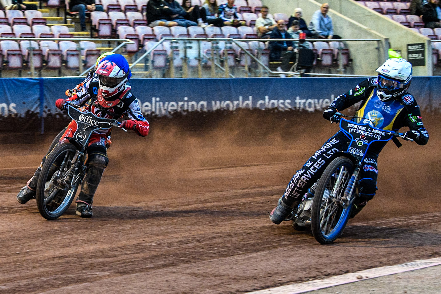 Max Clegg (White) inside Freddy Hodder (Blue) during the National Development League match between Belle Vue Colts and Edinburgh Monarchs Academy at the National Speedway Stadium, Manchester on Friday 21st July 2023. (Photo: Ian Charles | MI News)