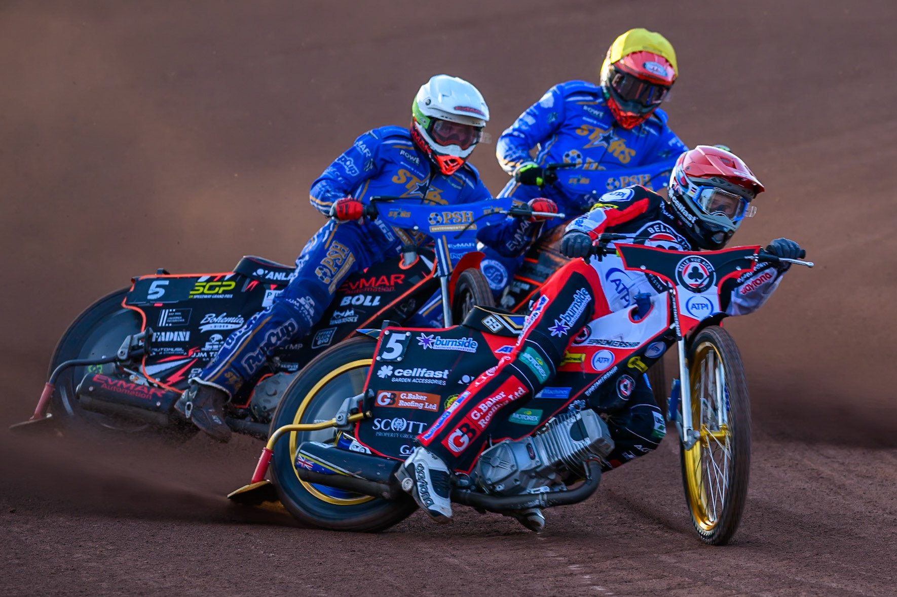 Jason Doyle of Belle Vue Aces in Red leading Jan Kvech of Kings Lynn Stars in White  and Jordan Jenkins of Kings Lynn Stars in Yellow during the Rowe Motor Oil Premiership match between Belle Vue Aces and King's Lynn Stars at the National Speedway Stadium, Manchester on Monday 10th August 2026. (Photo: Ian Charles | MI News)