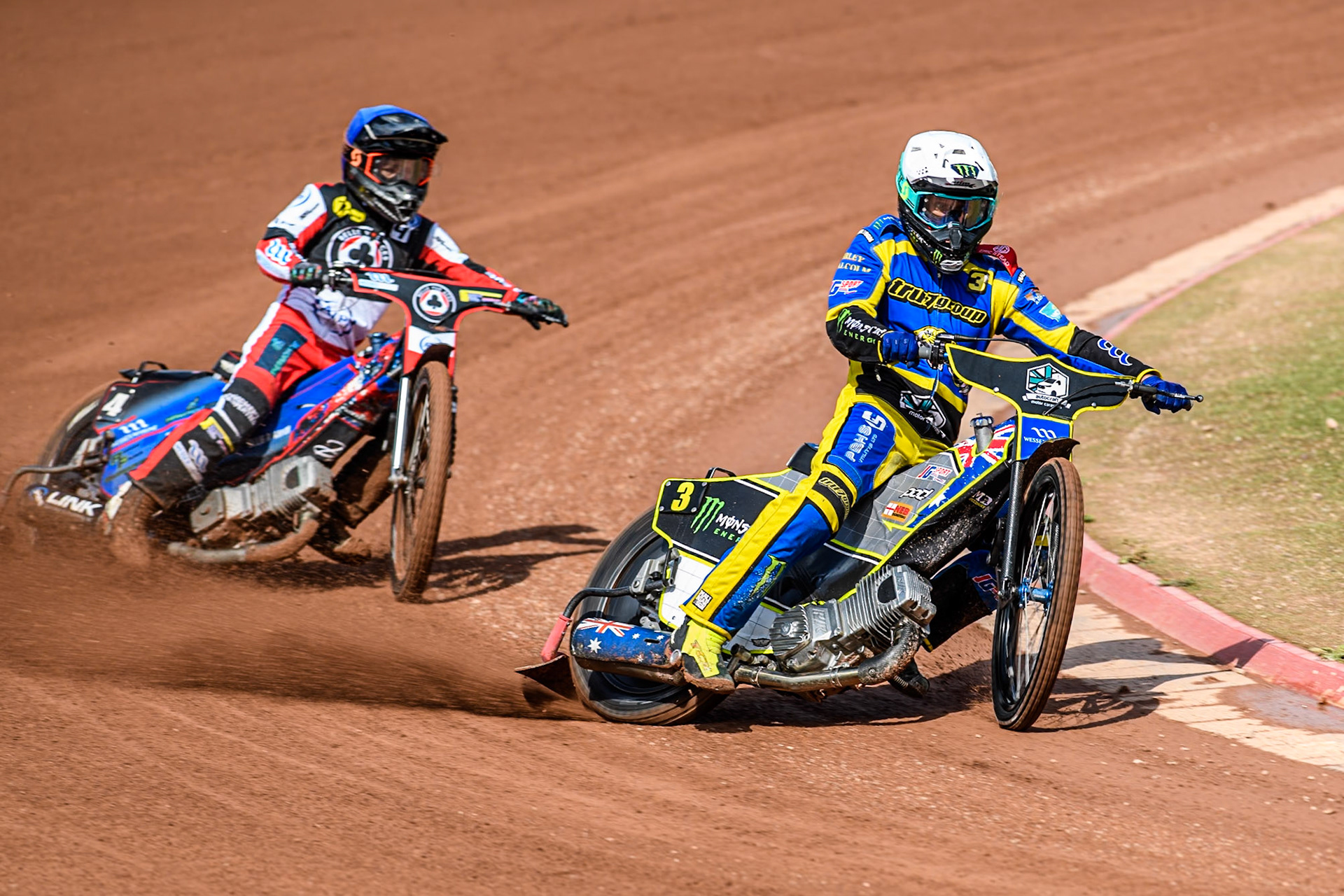 Sheffield Tigers' Chris Holder  in White leading Belle Vue Aces' Ben Cook  in Blue during the Rowe Motor Oil Premiership match between Belle Vue Aces and Sheffield Tigers at the National Speedway Stadium, Manchester on Monday 26th August 2024. (Photo: Ian Charles | MI News)