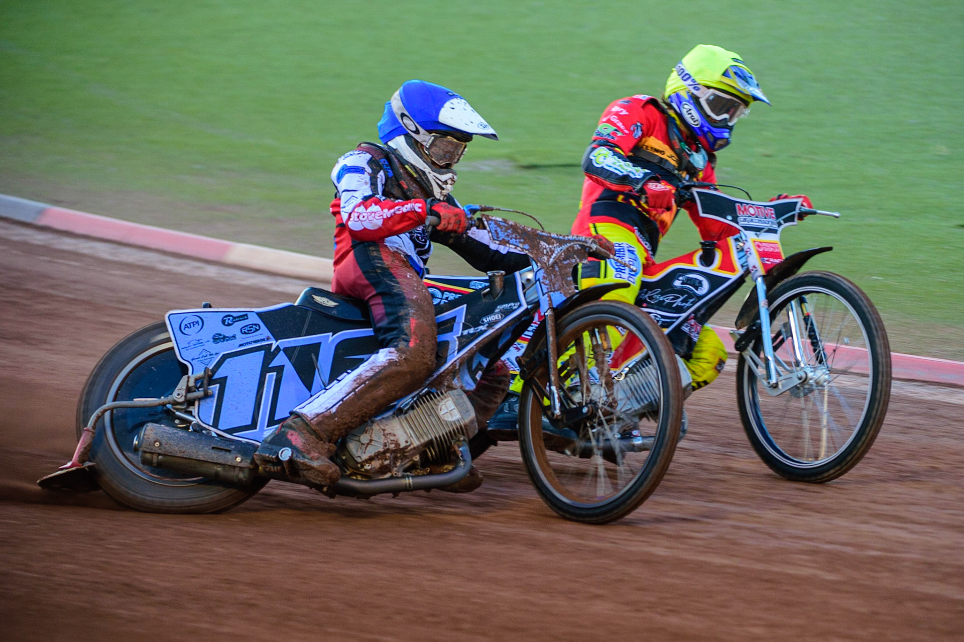 Sam McGurk  (Blue) outside Tom Spencer  (Yellow) during the National Development League match between Belle Vue Aces and Leicester Lions at the National Speedway Stadium, Manchester on Friday 19th August 2022. (Credit: Ian Charles | MI News)