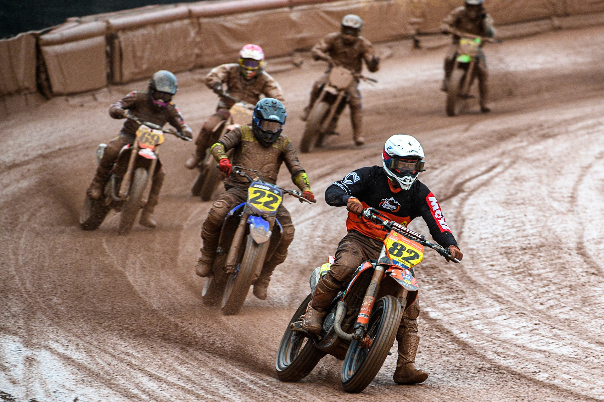 Markus Jell (82) from Germany leads Ondřej Svědík (22) from Czech Rep. and the pack during the FIM World Flat Track Championship Round 1 at the National Speedway Stadium, Manchester on Saturday 5th August 2023. (Photo: Ian Charles | MI News)