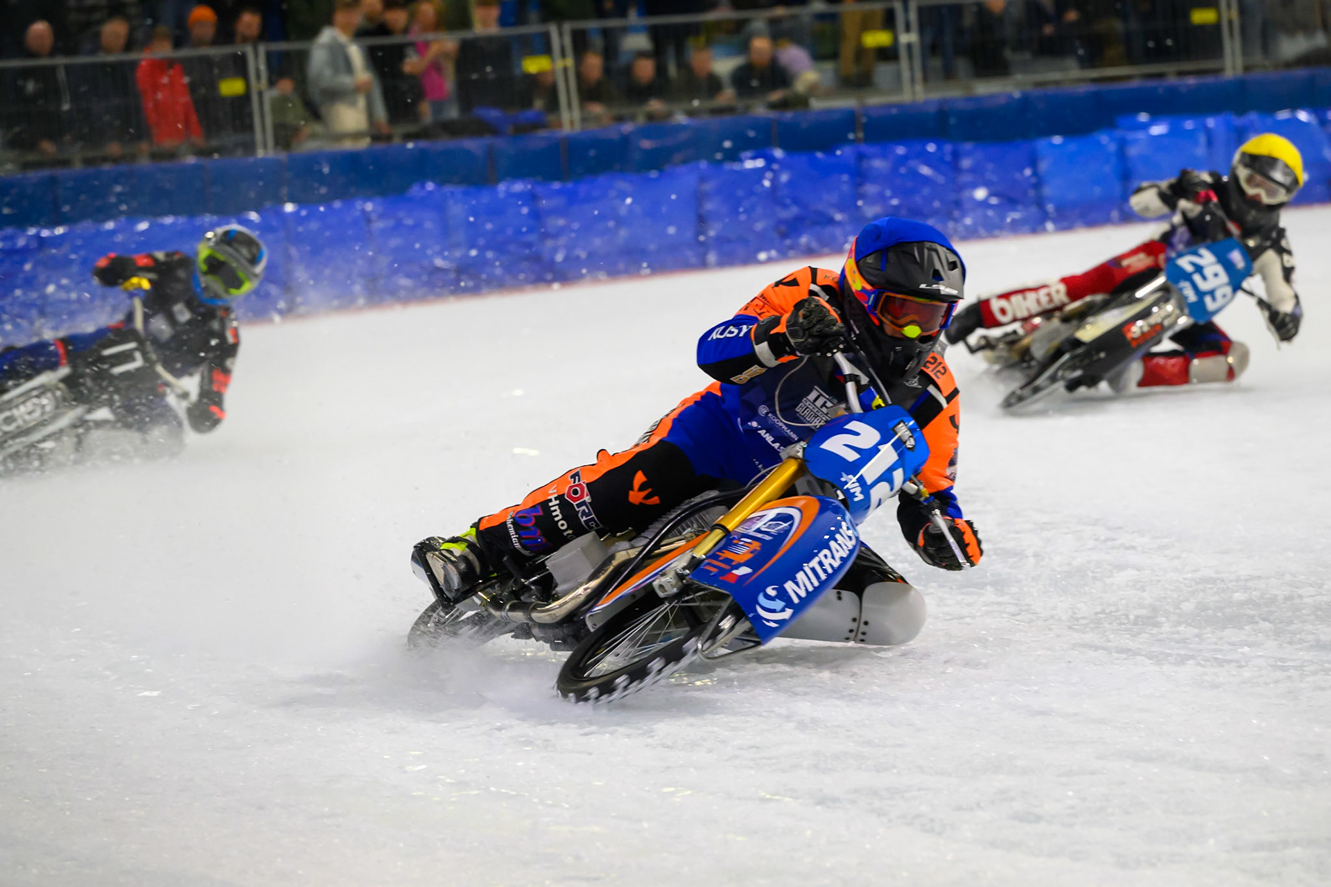 Lukas Hutla (212) of Czechia in Blue leading Martin Posch (299) of Austria  in Yellow and Melwyn Bjorklin (17) of Sweden  in White during the FIM Ice Speedway Gladiators World Championship Final 3 at Ice Rink Thialf, Heerenveen on Saturday 11th April 2026. (Photo: Ian Charles | MI News)