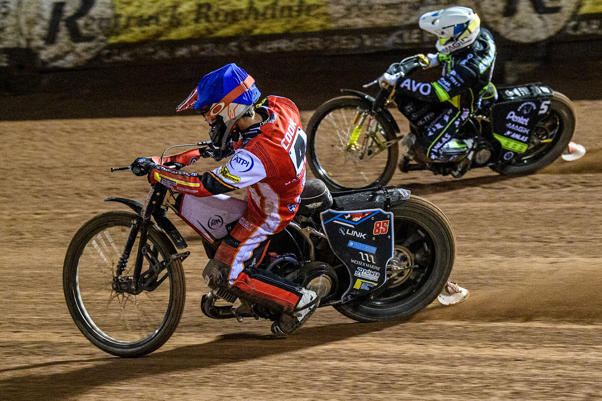 Zach Cook of Belle Vue Aces in Blue rides inside Emil Sayfutdinov of Ipswich Witches in White during the Premiership Cup Quarter Final 1st Leg match between Belle Vue Aces and Ipswich Witches at the National Speedway Stadium, Manchester on Monday 24th March 2025. (Photo: Ian Charles | MI News)
