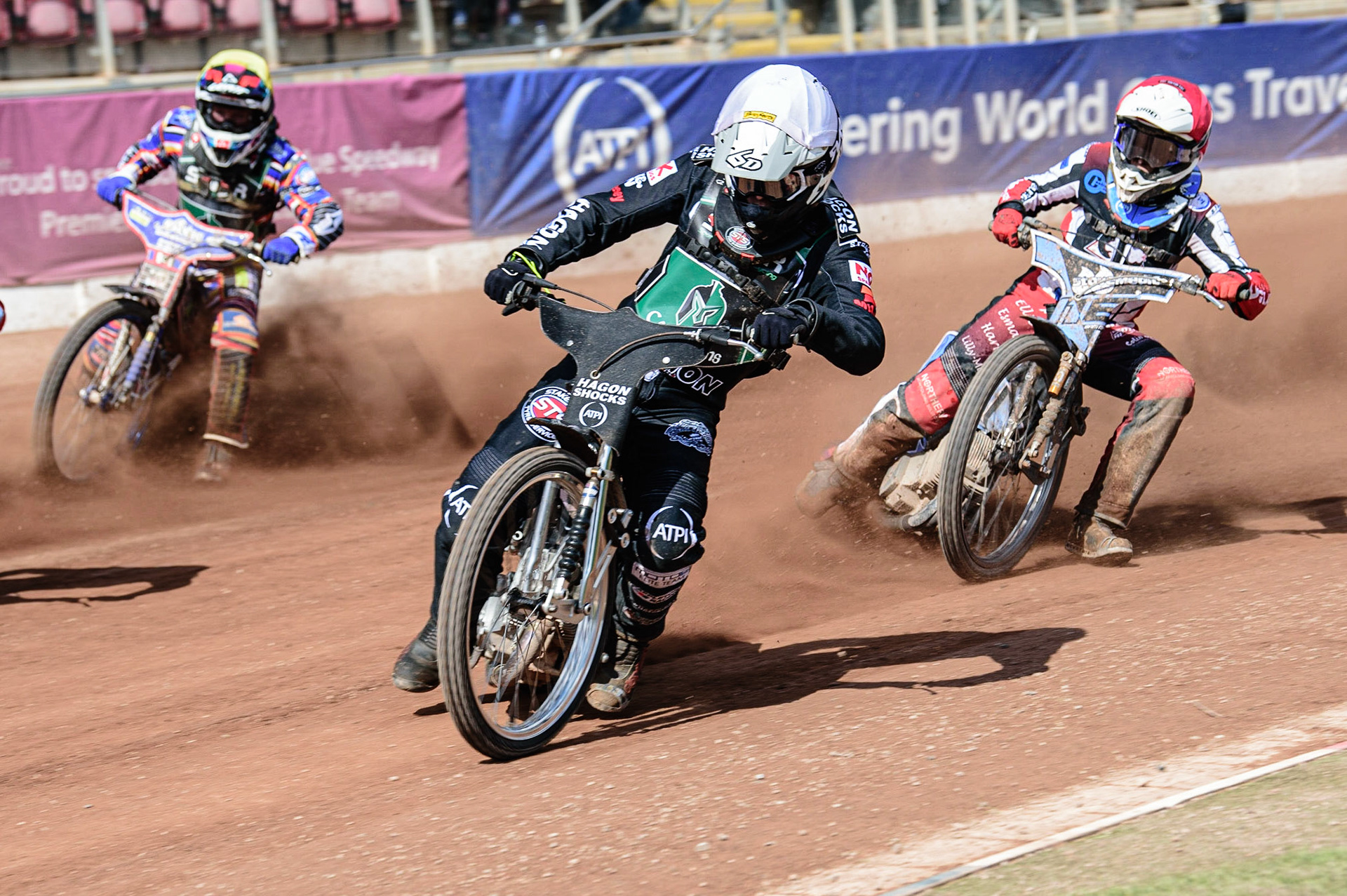 MANCHESTER, UK. APR 15TH  Dan Gilkes  (White) leads Sam McGurk  (Red) and Henry Atkins  (Yellow)  during the National Development League match between Belle Vue Colts and Plymouth Centurions at the National Speedway Stadium, Manchester on Friday 15th April 2022. (Credit: Ian Charles | MI News)