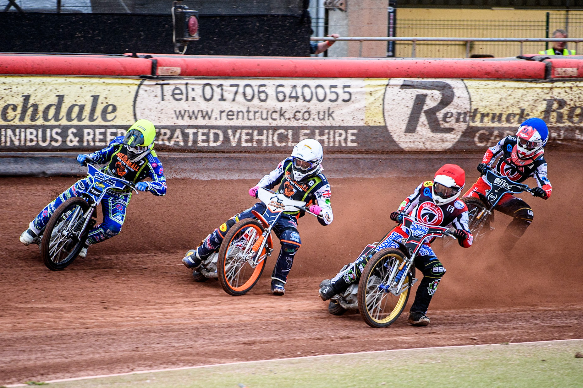 Paul Bowen (Red) inside William Richardson (White) and Arran Butcher (Yellow) with Freddy Hodder (Blue) behind during the National Development League match between Belle Vue Colts and Mildenhall Fens Tigers at the National Speedway Stadium, Manchester on Friday 26th May 2023. (Photo: Ian Charles | MI News)