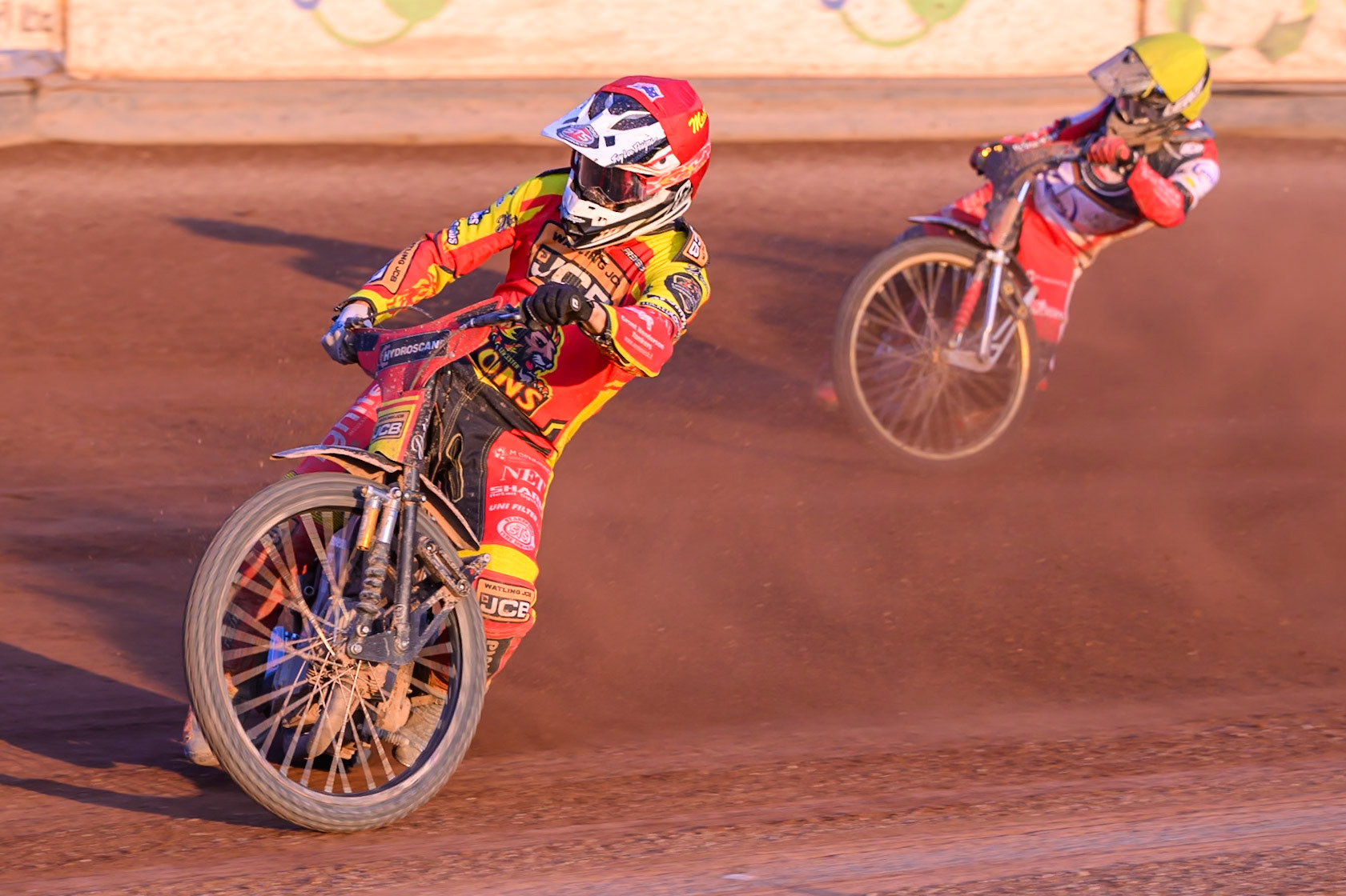 Leicester Lions' Sam Masters in Red leading Belle Vue Aces' Norick Blodorn in Yellow during the Rowe Motor Oil Premiership match between Leicester Lions and Belle Vue Aces at the Hydroscand Arena, Leicester on Thursday 19th June 2025. (Photo: Ian Charles | MI News)