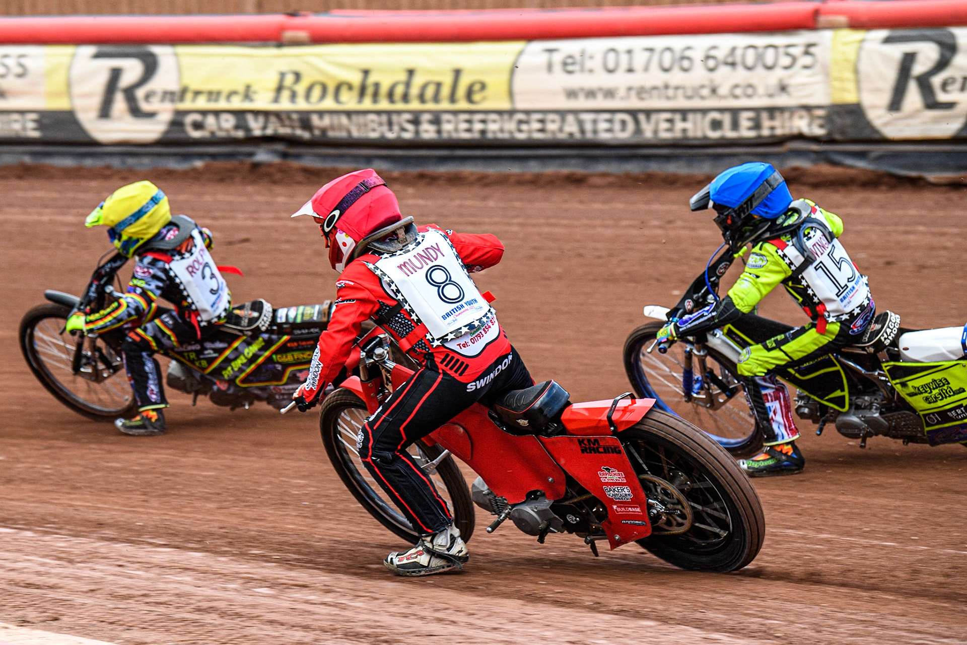 Kayden Munday  (Red) chases Archie Rolph  (Yellow) with Oliver Bovington (Blue) on the outside during the British Youth Championships at the National Speedway Stadium, Manchester on Friday 12th May 2023. (Photo: Ian Charles | MI News)
