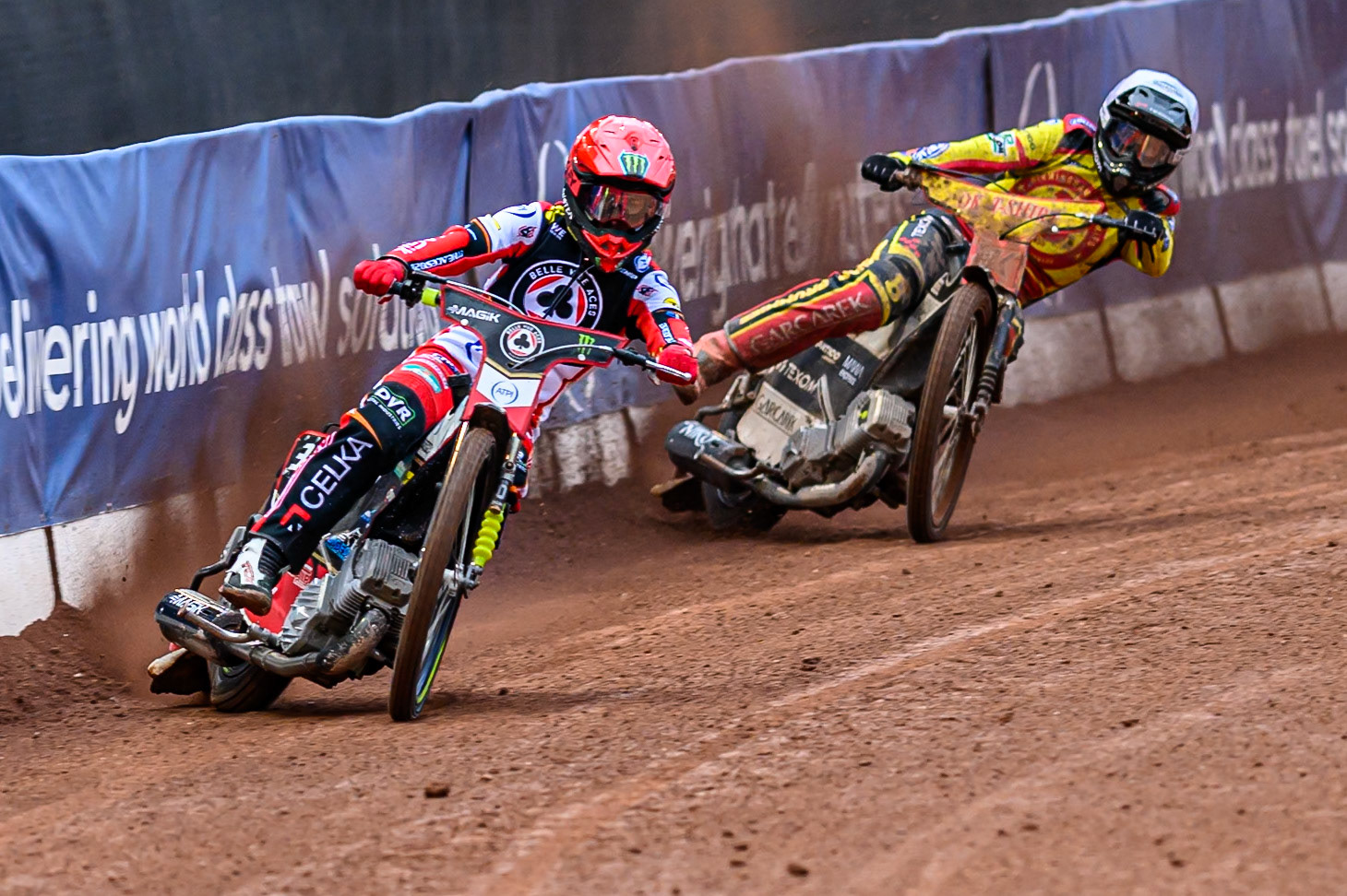 Belle Vue Aces' Jaimon Lidsey  in Red leading Birmingham Brummies' Tobias Musielak  in White during the Rowe Motor Oil Premiership match between Belle Vue Aces and Birmingham Brummies at the National Speedway Stadium, Manchester on Monday 7th July 2025. (Photo: Ian Charles | MI News)