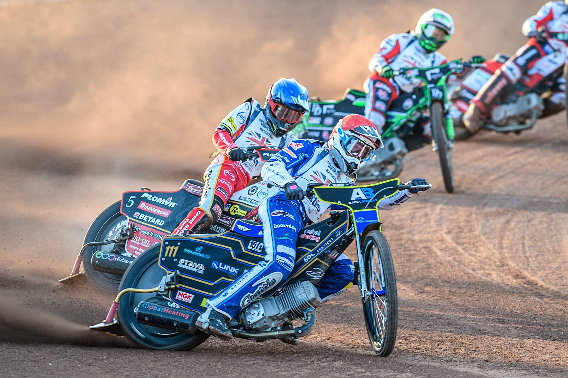Anders Rowe in Red leading Dan Bewley in Blue and Danny King in Yellow during the Attis Insurance Sports Division British Final at the National Speedway Stadium, Manchester on Monday 12th May 2025. (Photo: Ian Charles | MI News)