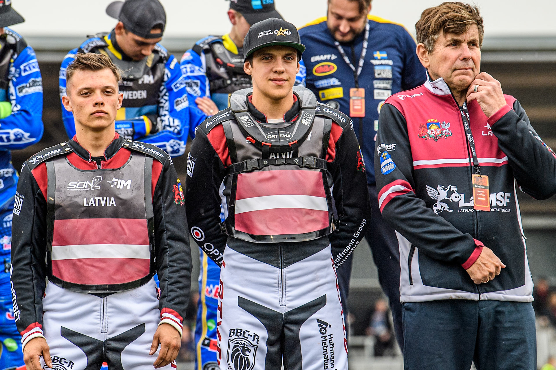 LATVIA: (L to R) Nikita Kaulins, Artjoms Juhno and Latvian Team Manager, Vladimirs Ribnikovs during the Monster Energy FIM Speedway of Nations 2 (Under 21) Final at the National Speedway Stadium, Manchester on Friday 12th July 2024. (Photo: Ian Charles | MI News)