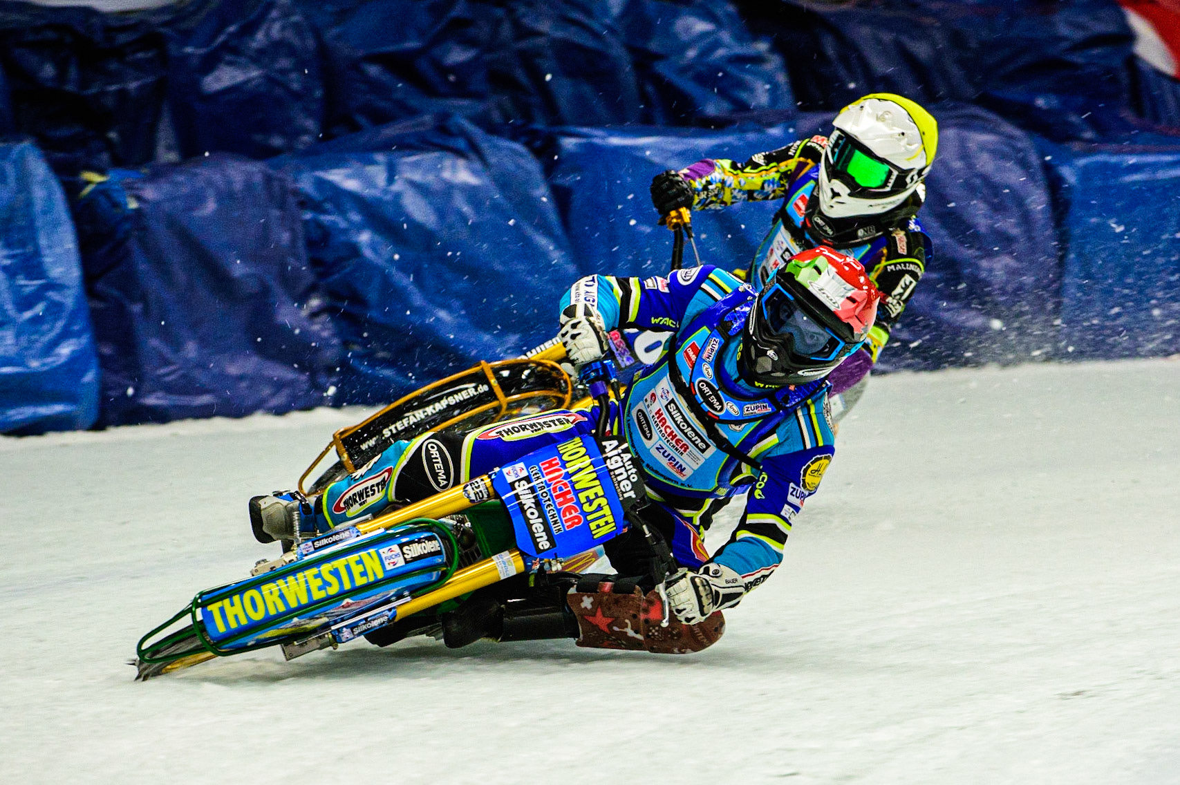 Luca Bauer (Red) leads Max Niedermaier (Yellow) during the Race of Legends at the Max-Aicher-Arena, Inzell on Friday 17th March 2023. (Photo: Ian Charles | MI News)