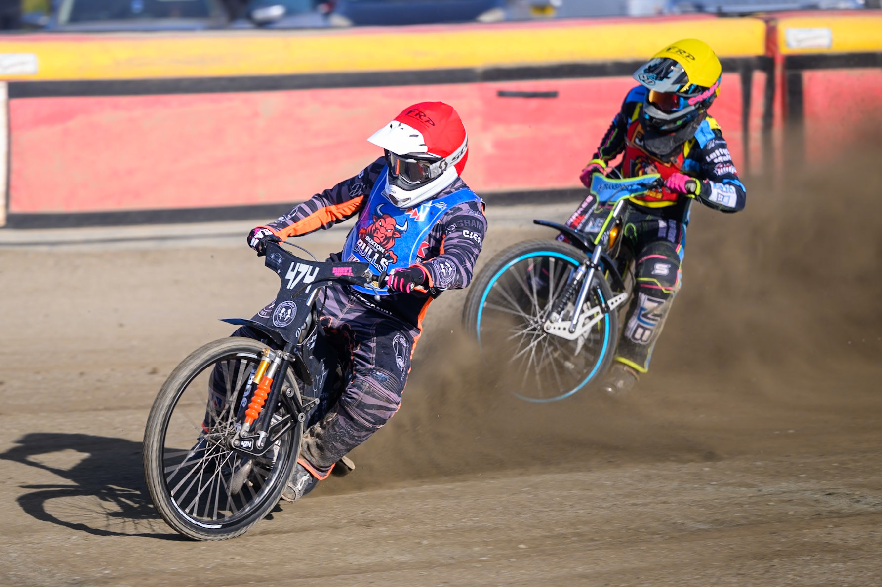 Jack Roberts of Buxton Bulls   in Red leading Eli Meadows  of Leicester Lion Cubs  in Yellow during the WSRA National Development League match between Buxton Bulls and Leicester Lion Cubs at Hi-Edge Speedway, Buxton on Sunday 4th October 2026. (Photo: Ian Charles | MI News)
