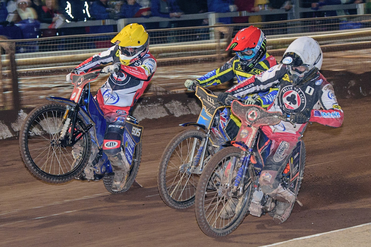 Robert Lambert  (Yellow) picks up grip outside Jack Holder  (Red) and Brady Kurtz  (White) during the SGB Premiership Grand Final 2nd Leg between Sheffield Tigers and Belle Vue Aces at Owlerton Stadium, Sheffield on Thursday 13th October 2022. (Credit: Ian Charles | MI News)