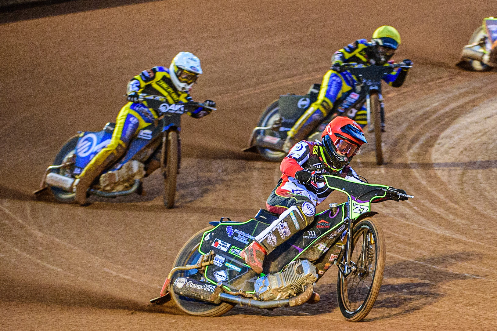 Tom Brennan  (Red) leads Lewis Kerr  (White) and Dan Gilkes  (Yellow) during the SGB Premiership match between Belle Vue Aces and Sheffield Tigers at the National Speedway Stadium, Manchester on Monday 27th March 2023. (Photo: Ian Charles | MI News)