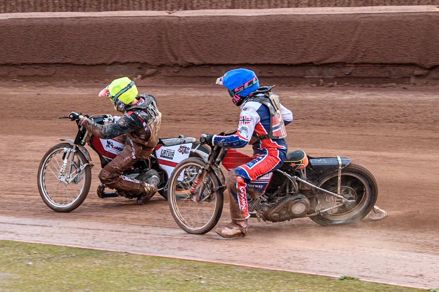 Glenn Moi of Norway in Blue chases Daniils Kolodinskis of Latvia in Yellow during the Monster Energy FIM Speedway of Nation Semi Final 2 at the National Speedway Stadium, Manchester on Wednesday 10th July 2024. (Photo: Ian Charles | MI News)