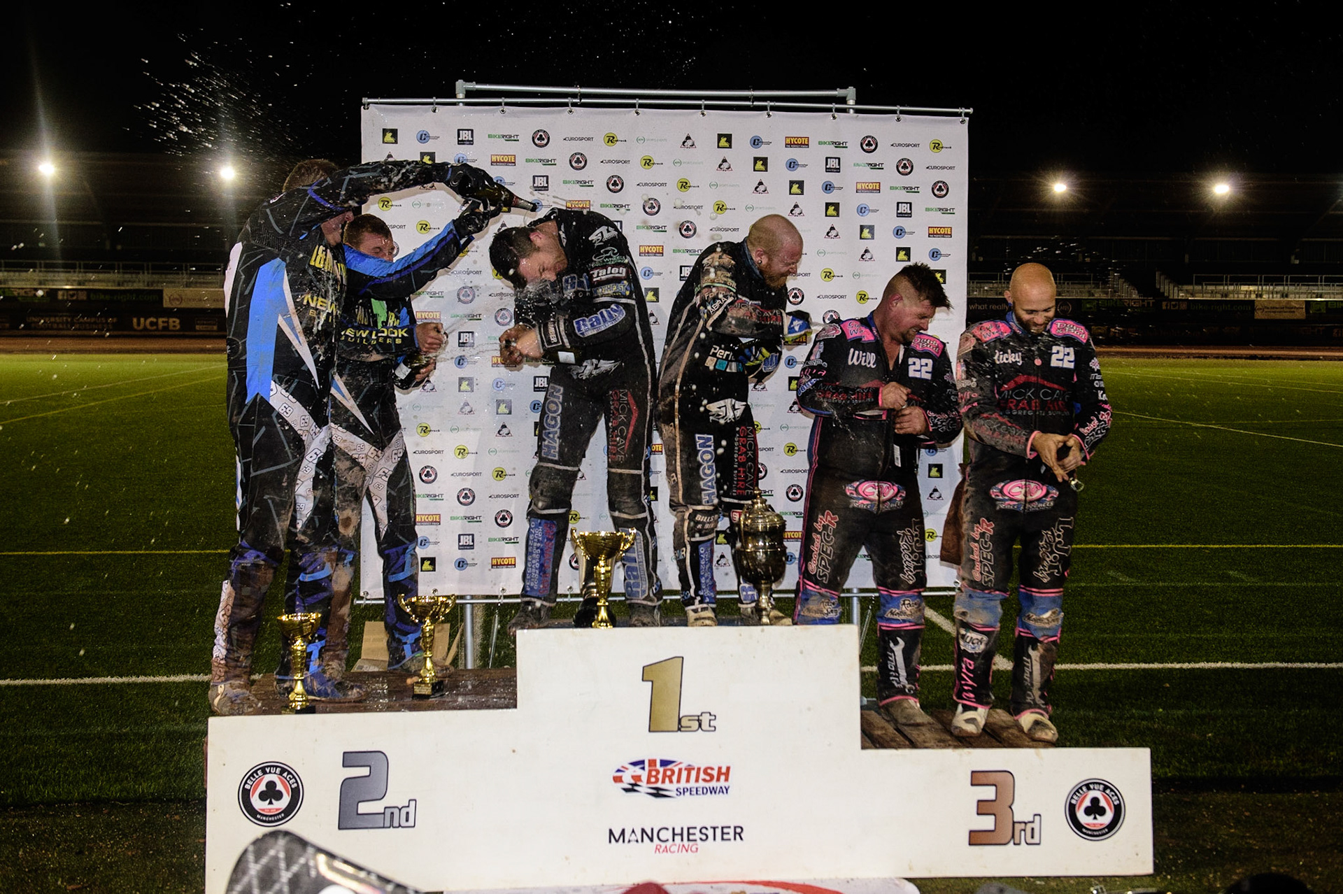 MANCHESTER, UK. OCT 30TH   Champagne celebrations during the Manchester Masters Sidecar Speedway and Flat Track Racing at the National Speedway Stadium, Manchester on Saturday 30th October 2021. (Credit: Ian Charles | MI News)