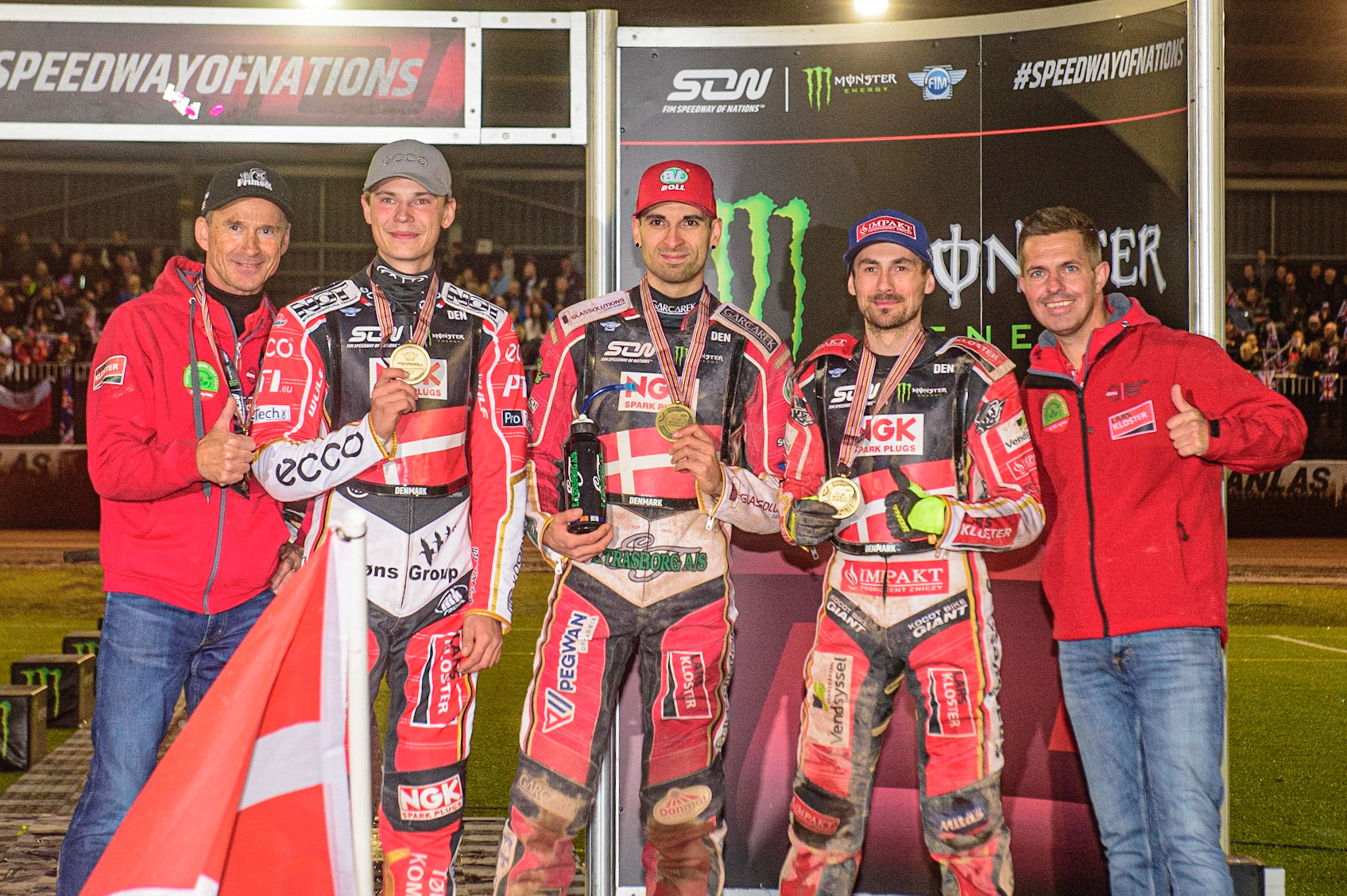 MANCHESTER, UK. OCT 17TH Bronze medal winners Denmark (l-r) Hans Nelson (Manager), Mads Hansen, Mikkel Michelsen. Leon Madsen and Henrik Møller (manager) during the Monster Energy FIM Speedway of Nations at the National Speedway Stadium, Manchester on Sunday  17th October 2021. (Credit: Ian Charles | MI News)