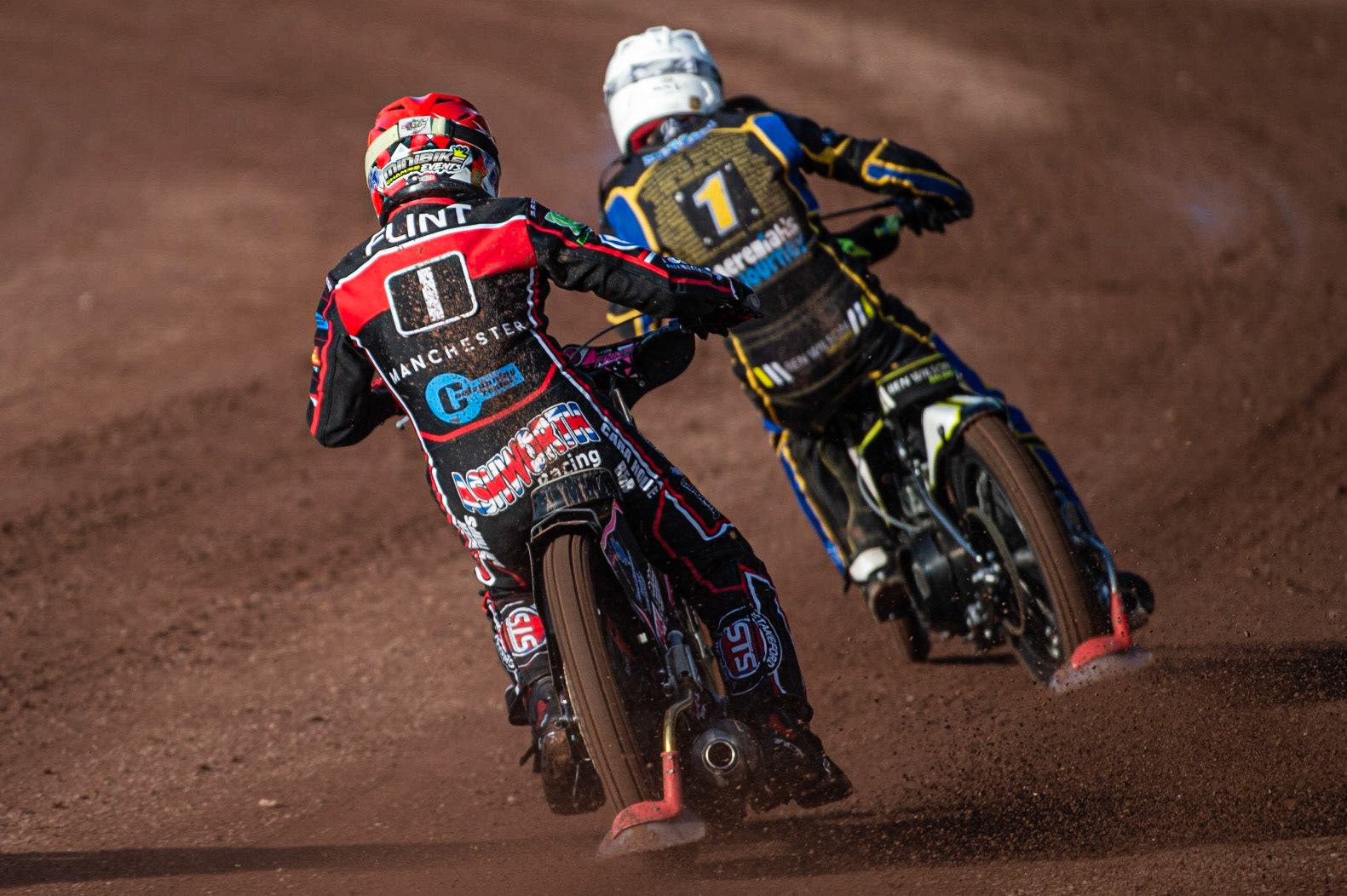 Photo: Ian Charles

Leon Flint  (Red) chases Ben Wilson (White)

Belle Vue Colts v Plymouth Gladiators National League, Belle Vue National Speedway Stadium, Manchester, Thursday 23  May  2019