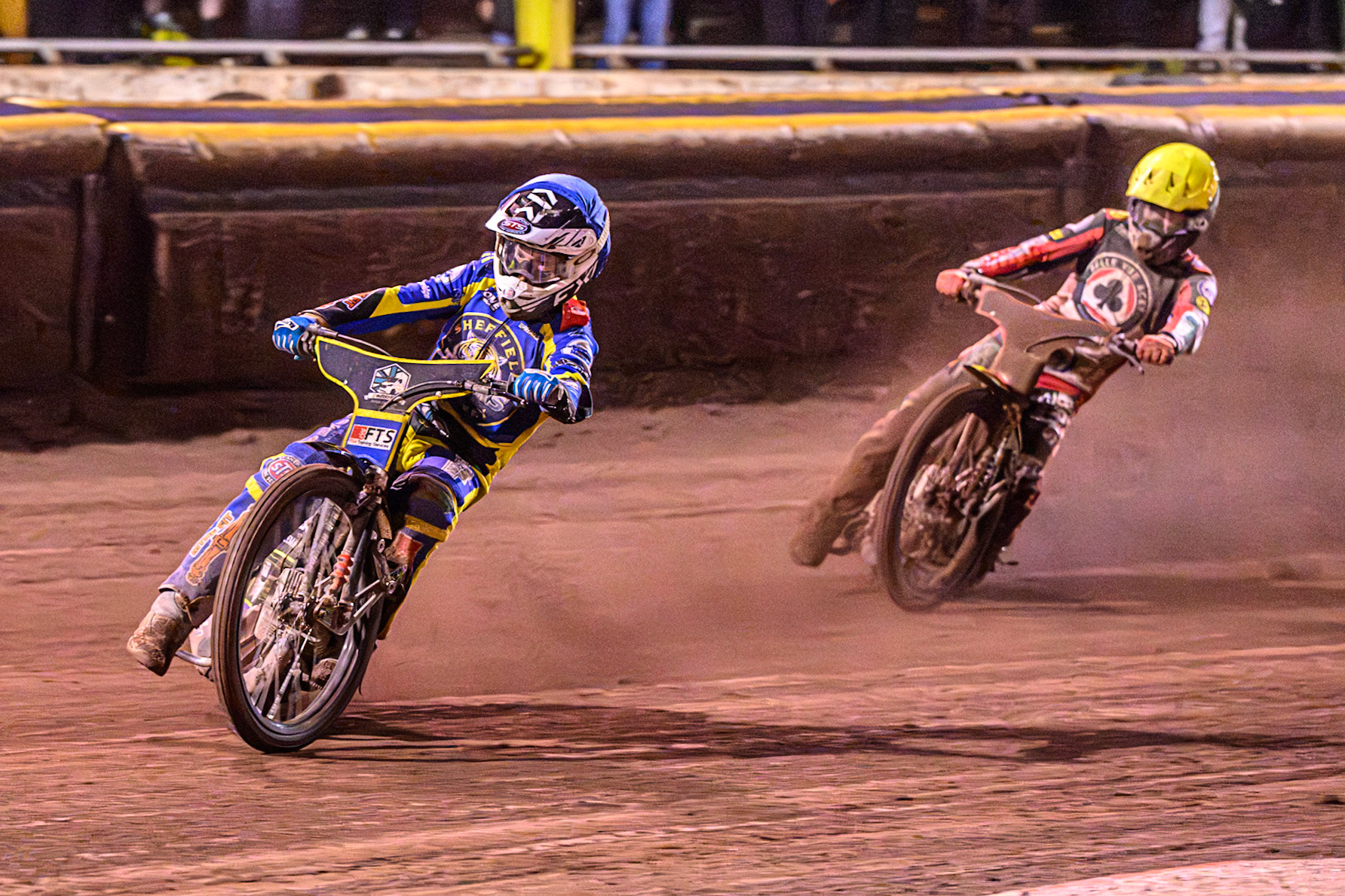 Jye Etheridge of Sheffield Tigers in Blue leading Tate Zischke of Belle Vue Aces in Yellow during the Rowe Motor Oil Premiership Grand Final 1st Leg match between Sheffield Tigers and Belle Vue Aces at Owlerton Stadium, Sheffield on Monday 12th October 2026. (Photo: Ian Charles | MI News)
