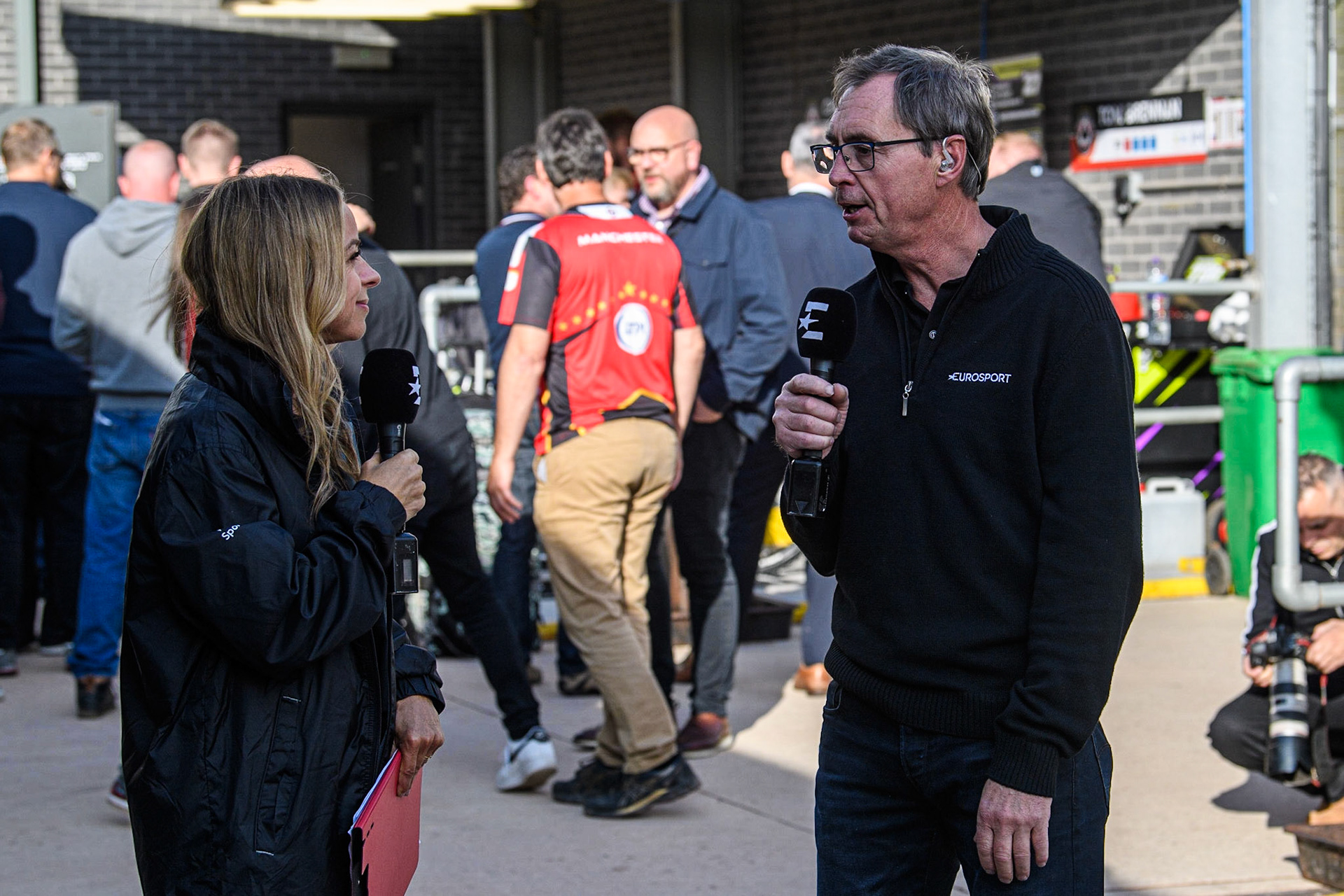 Eurosport presenters Abi Stephens (left) and Kelvin Tatum record the programme openingduring the Sports Insure Premiership match between Belle Vue Aces and Ipswich Witches at the National Speedway Stadium, Manchester on Monday 17th July 2023. (Photo: Ian Charles | MI News)