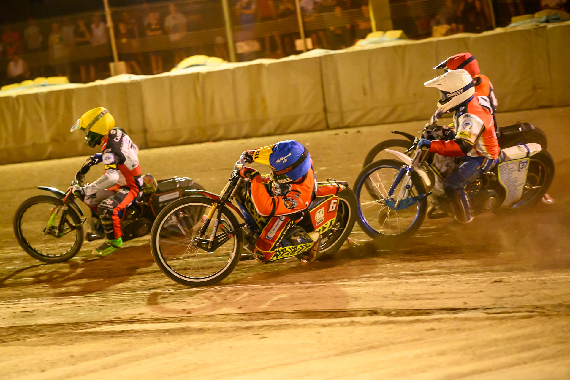 Mitch McDiarmid of Northampton Foxes in Blue on the inside of Will Cairns of Belle Vue Aces  in Yellow , Chris Harris Guest Rider for Belle Vue Aces in White  and Adam Ellis of Northampton Foxes  in Red during the Rowe Motor Oil Premiership match between Northampton Foxes and Belle Vue Aces at Northampton International Shaleway, Northampton on Thursday 13th August 2026. (Photo: Ian Charles | MI News)