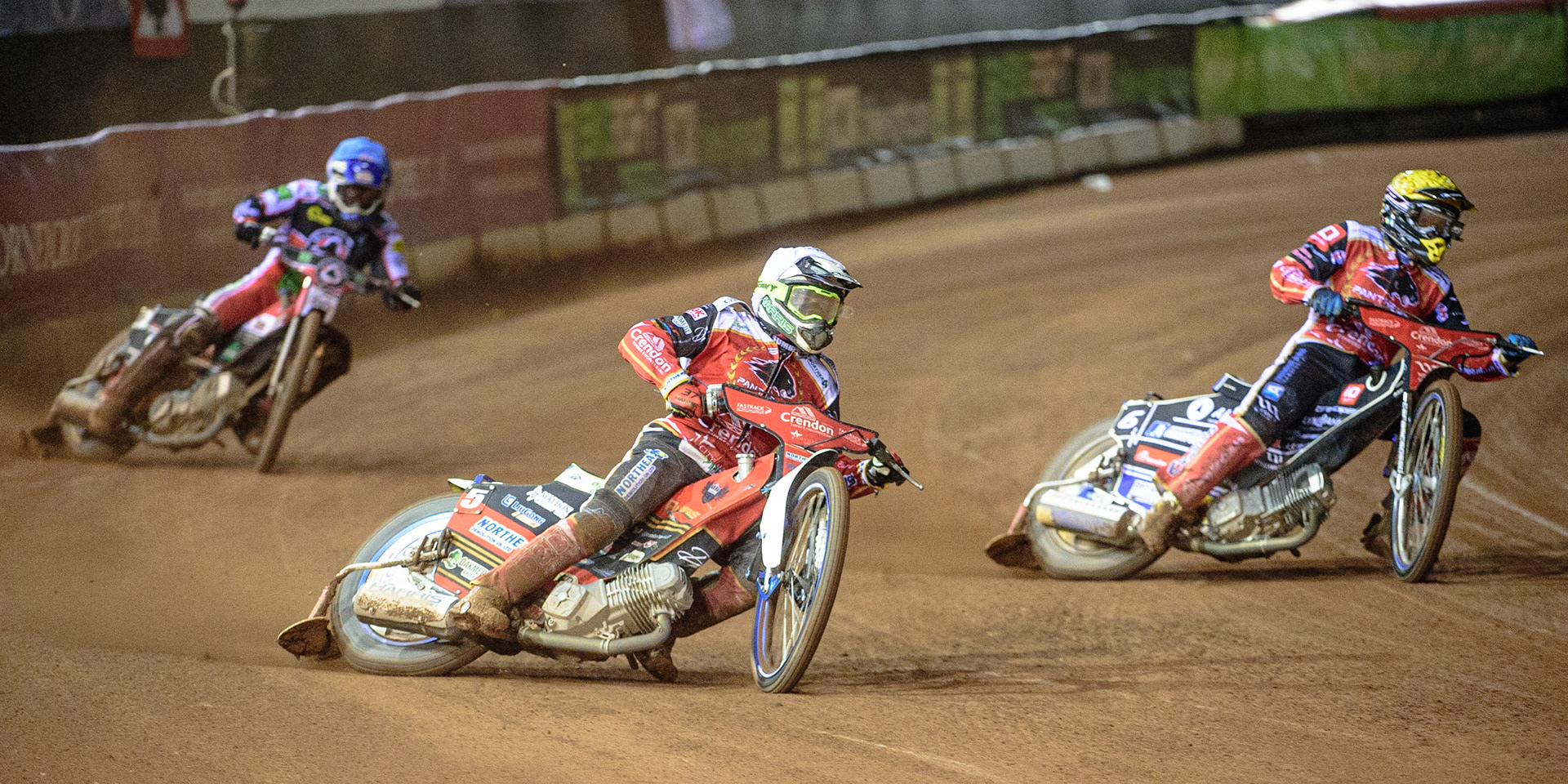 MANCHESTER, UK. OCT 11TH  Chris Harris  (White) and Bjarne Pedersen (Yellow) lead Richie Worrall  (Blue) during the SGB Premiership Grand Final 1st Leg between Belle Vue Aces and Peterborough Panthers at the National Speedway Stadium, Manchester on Monday 11th October 2021. (Credit: Ian Charles | MI News)