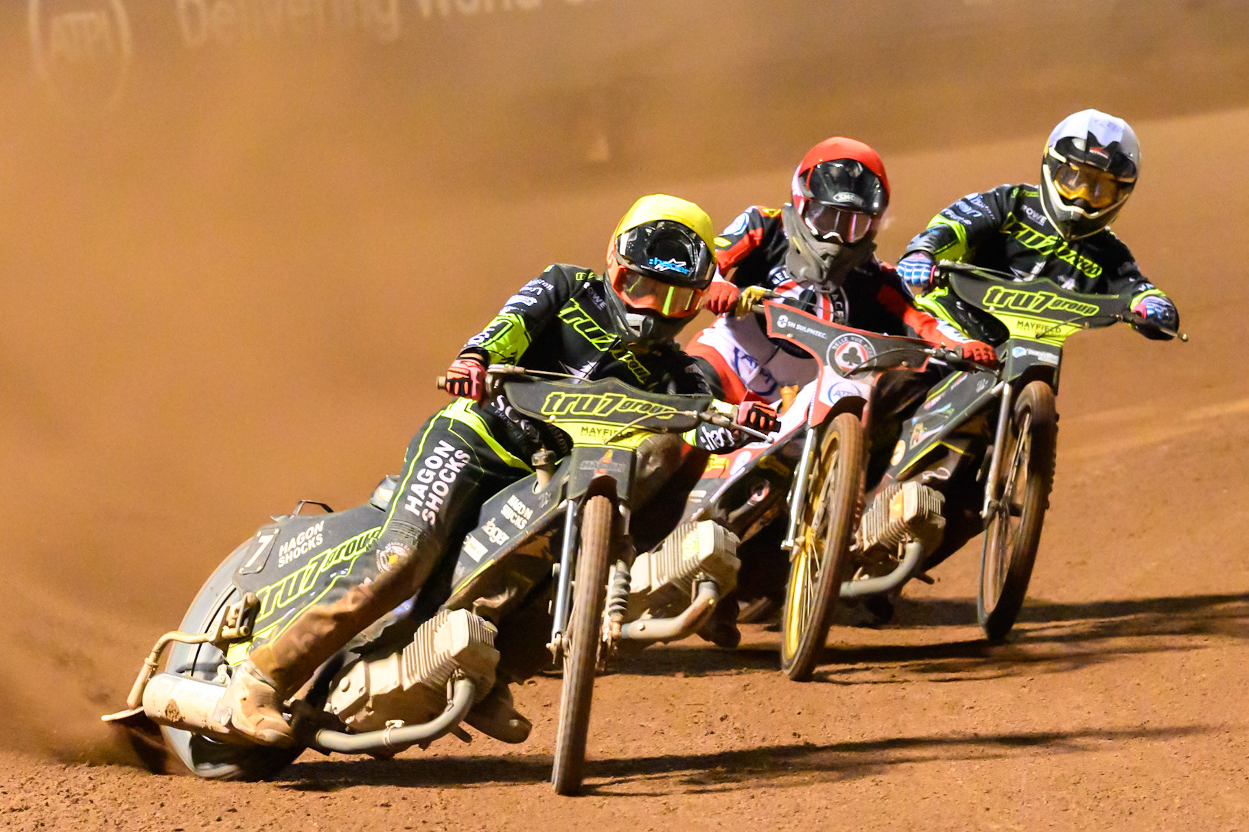Jason Edwards of Ipswich Witches in Yellow leading Norick Blödorn of Belle Vue Aces in Red  and Scott Nichols of Ipswich Witches in White during the Rowe Motor Oil Premiership Play Off Semi Final 2nd leg match between Belle Vue Aces and Ipswich Witches at the National Speedway Stadium, Manchester on Monday 28th September 2026. (Photo: Ian Charles | MI News)