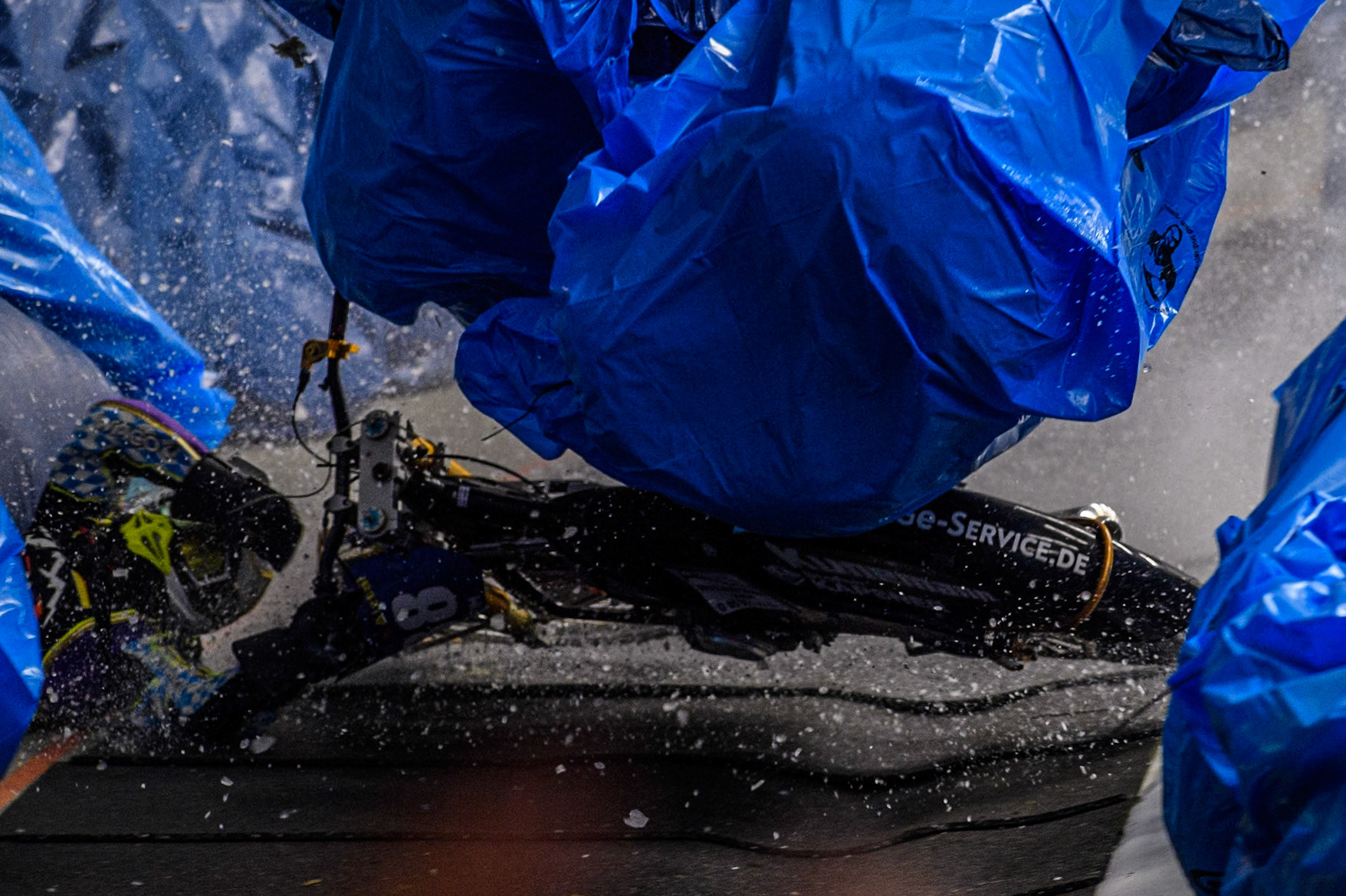 Max Niedermaier  (88) of Germany spins off and hits the bales during the Ice Speedway Gladiators World Championship Final 1 at Max-Aicher-Arena, Inzell on Saturday 15th March 2025. (Photo: Ian Charles | MI News)