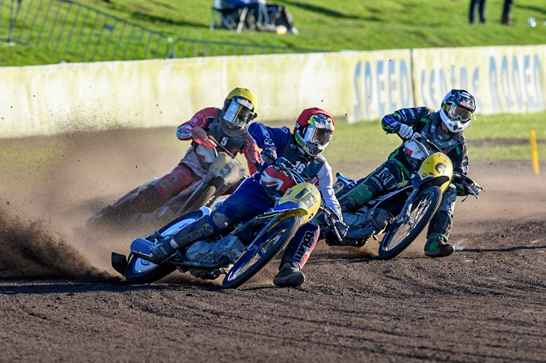 Chris Harris (Red) leads  Denmark’s Jacob Bukhave (Yellow) and Tobias Thomsen (Black &amp; White) during the FIM Long Track Of Nations event at the Speed Centre Roden on Sunday 24th September 2023. (Photo: Ian Charles | MI News)