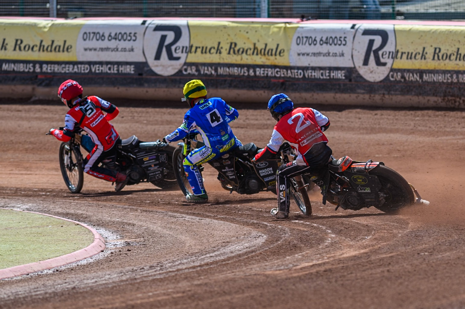 Belle Vue Colts' Connor King in Blue chases Oxford Chargers' Ashton Vale  in Yellow and Belle Vue Colts' Freddy Hodder  in Red during the WSRA National Development League match between Belle Vue Colts and Oxford Chargers at the National Speedway Stadium, Manchester on Sunday 1st June 2025. (Photo: Ian Charles | MI News)