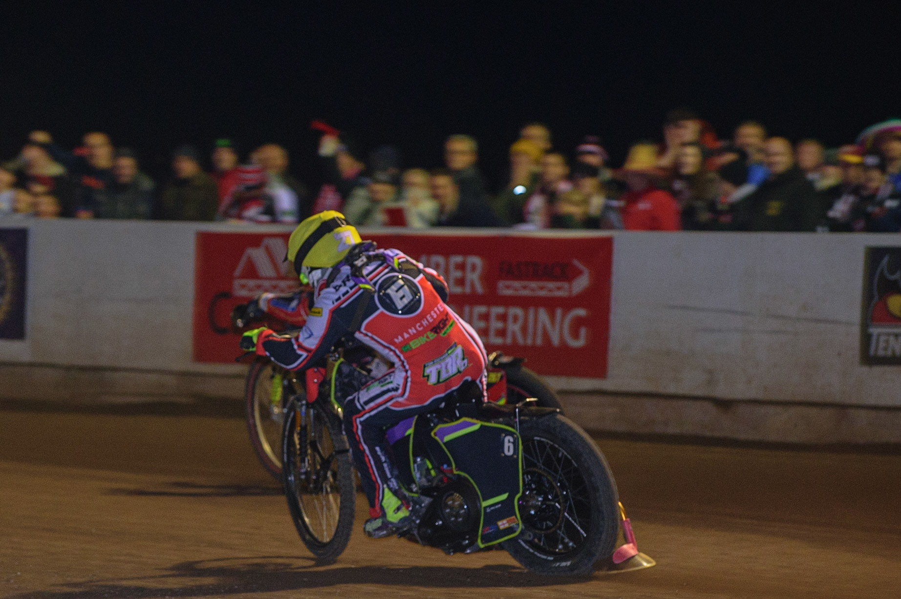 PETERBOROUGH, UK. OCT 14TH Tom Brennan  (Yellow) chases Bjarne Pedersen (partially hidden) during the SGB Premiership Grand Final 2nd leg between Peterborough and Belle Vue Aces at East of England Showground, Peterborough on Thursday 14th October 2021. (Credit: Ian Charles | MI News)