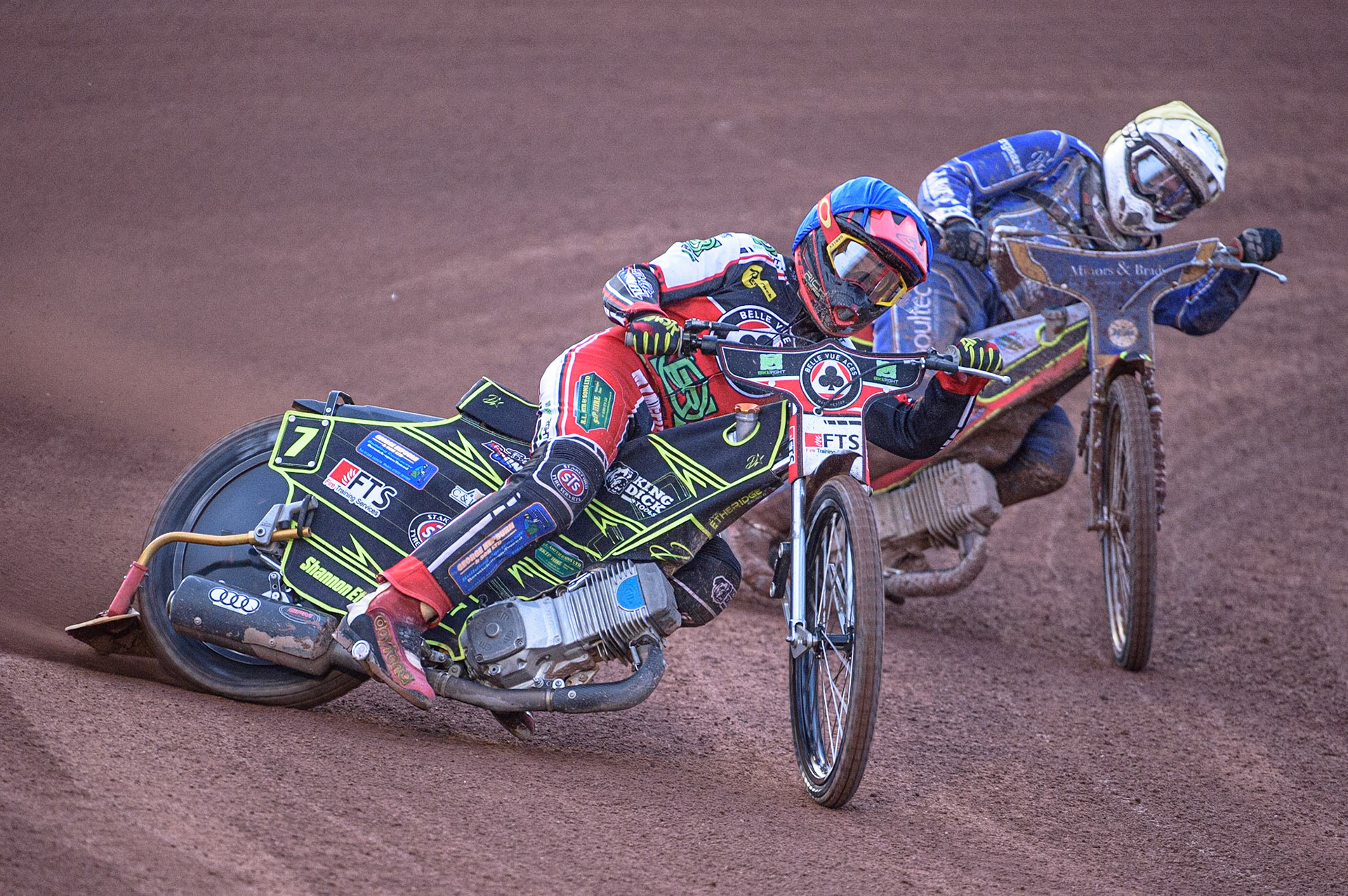 MANCHESTER, UK. AUGUST 23RD    Jye Etheridge  (Blue) leads Kasper Andersen  (Yellow) during the SGB Premiership match between Belle Vue Aces and King's Lynn Stars at the National Speedway Stadium, Manchester on Monday 23rd August 2021. (Credit: Ian Charles | MI News)