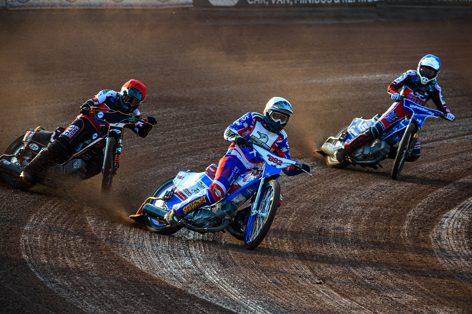 MANCHESTER, UK. JULY 23RD Jake Knight  (White) leads Jack Smith  (Red) and Harry McGurk  (Blue) during the National Development League match between Belle Vue Colts and Eastbourne Seagulls at the National Speedway Stadium, Manchester on Friday 23rd July 2021. (Credit: Ian Charles | MI News)