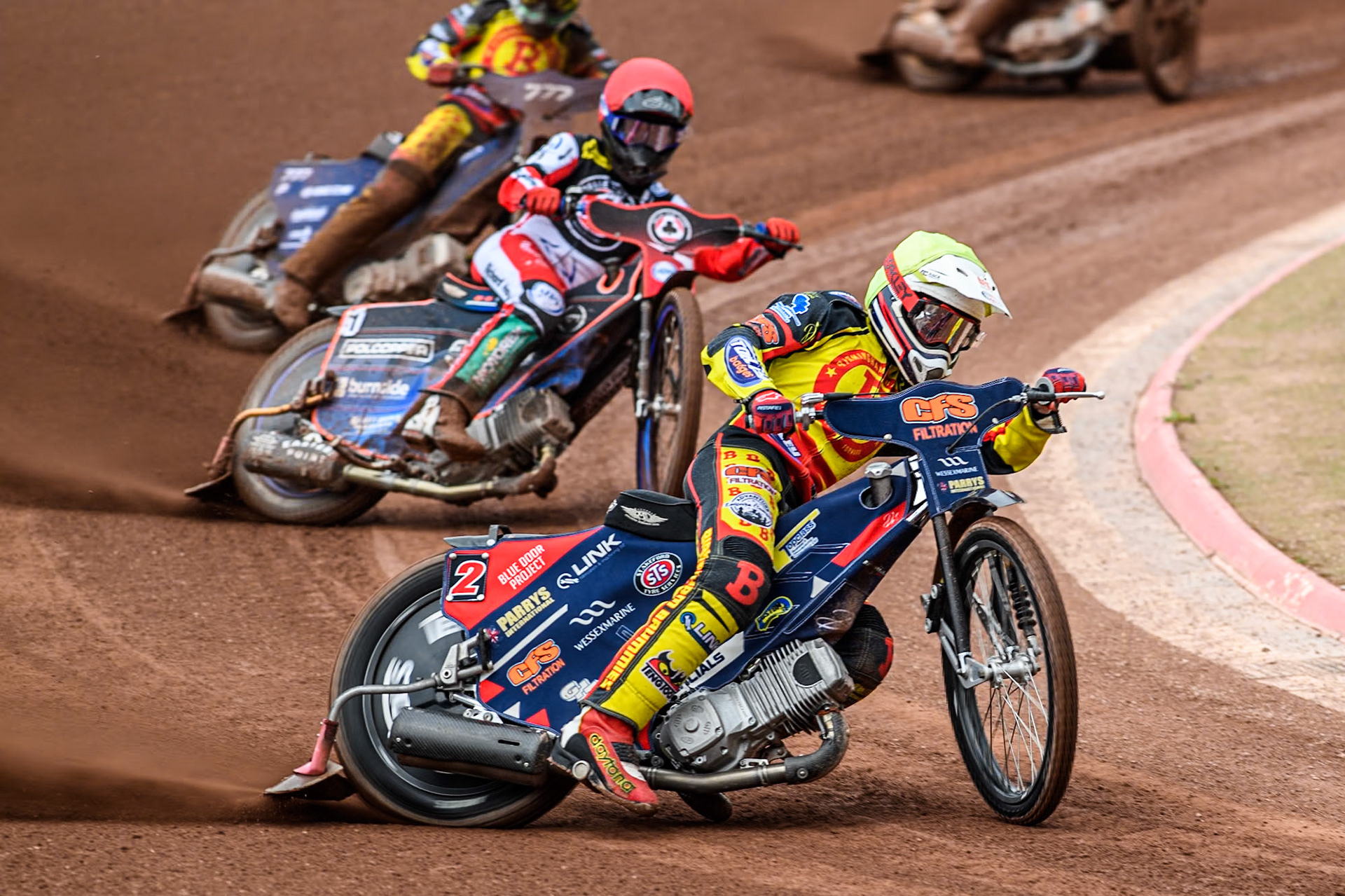 Birmingham Brummies' Steve Worrall  in Yellow \lk\ Belle Vue Aces' Brady Kurtz  in Red during the Rowe Motor Oil Premiership match between Belle Vue Aces and Birmingham Brummies at the National Speedway Stadium, Manchester on Monday 6th May 2024. (Photo: Ian Charles | MI News)