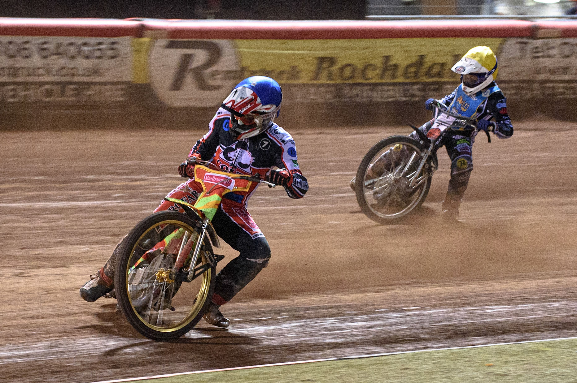 MANCHESTER, UK. AUGUST 20TH  Ben Woodhull  (Blue) leads Archie Freeman  (Yellow)during the National Development League match between Belle Vue Aces and Armadale Devils at the National Speedway Stadium, Manchester on Friday 20th August 2021. (Credit: Ian Charles | MI News)