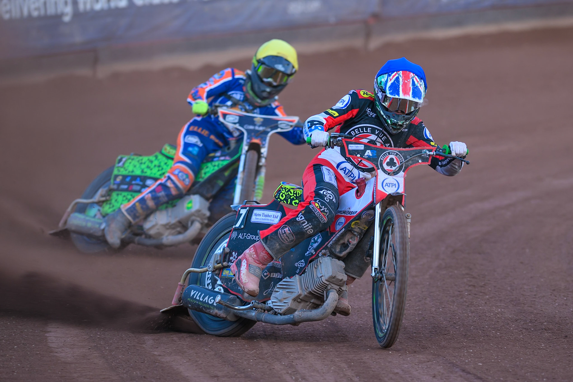 William Cairns of Belle Vue Aces in Blue leading Luke Harrison of Northampton Foxes in Yellow during the Rowe Motor Oil Premiership match between Belle Vue Aces and Northampton Foxes at the National Speedway Stadium, Manchester on Monday 13th July 2026. (Photo: Ian Charles | MI News)
