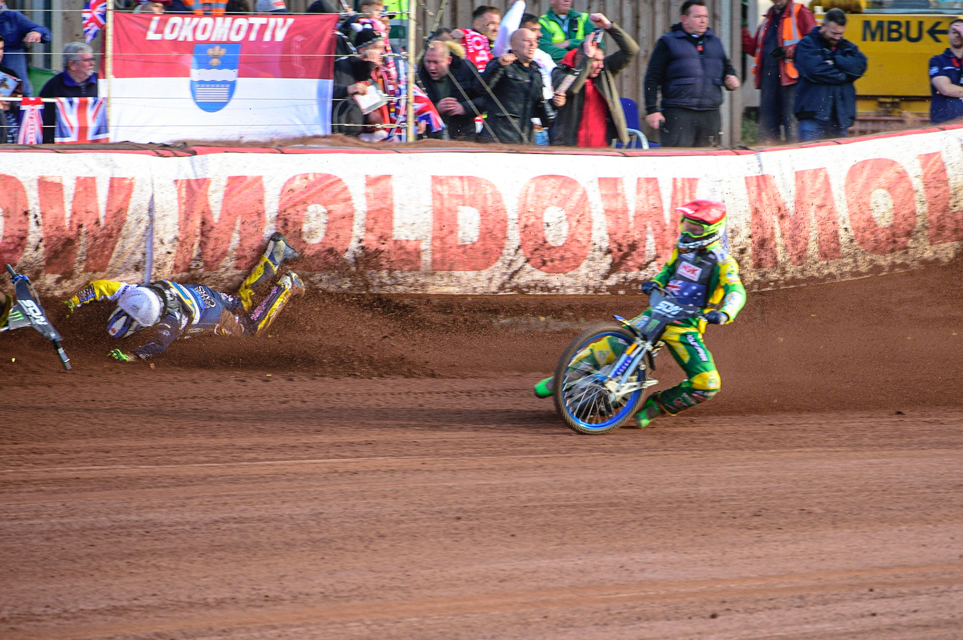 MANCHESTER, UK. OCT 16TH Pontus Aspgren of Sweden (White) slides off as Jacob Thorsell of Sweden hits the airfence during the Monster Energy FIM Speedway of Nations at the National Speedway Stadium, Manchester on Saturday  16th October 2021. (Credit: Ian Charles | MI News)