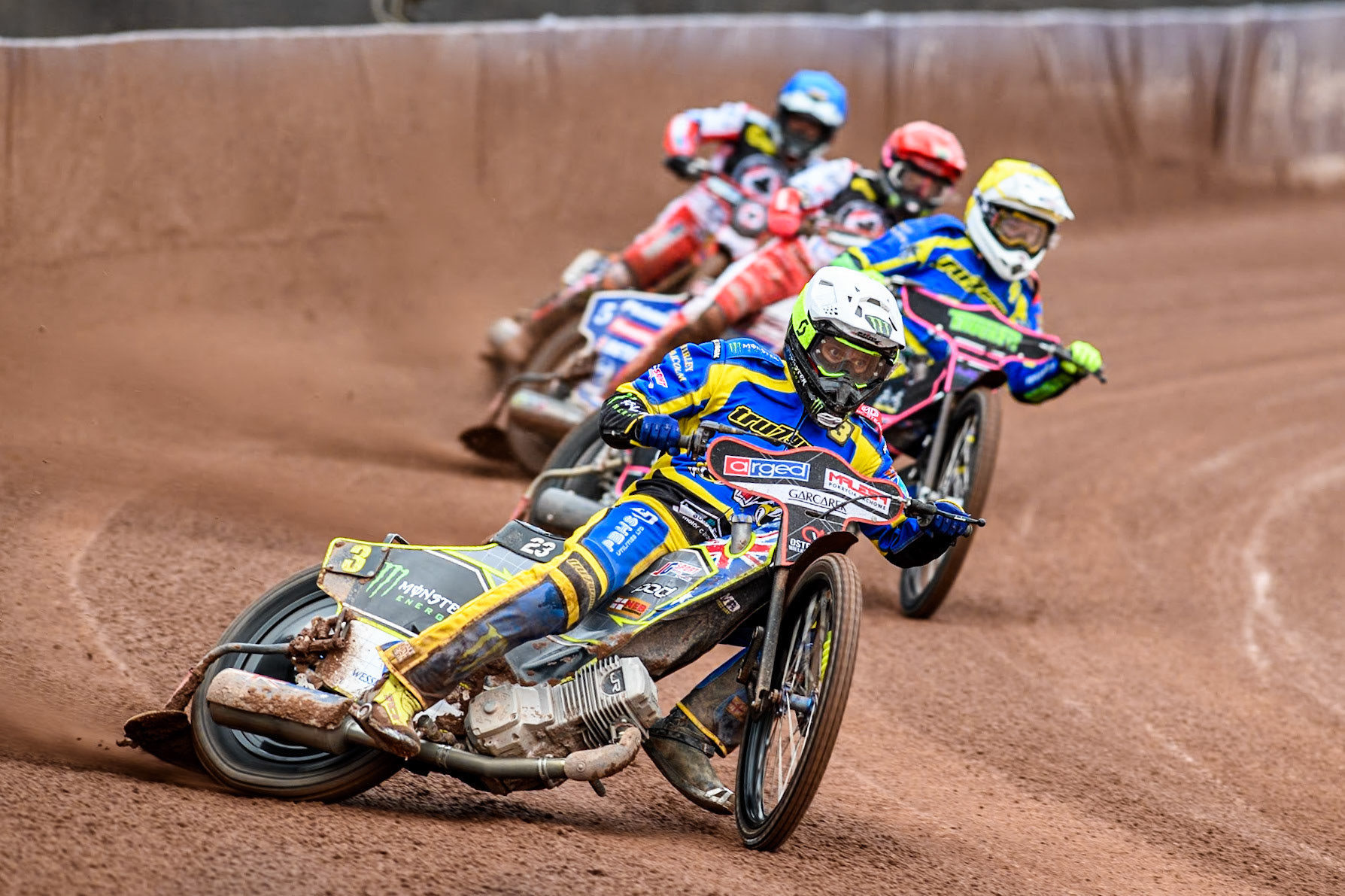 Sheffield Tigers' Chris Holder (White)leads  Sheffield Tigers' Josh Pickering (Yellow) Belle Vue ATPI Aces Dan Bewley (Red) and Belle Vue ATPI Aces Connor Mountain (Blue) during the Rowe Motor Oil Premiership KO Cup Quarter Final 1st Leg between Belle Vue Aces and Sheffield Tigers at the National Speedway Stadium, Manchester on Monday 1st April 2024. (Photo: Ian Charles | MI News)